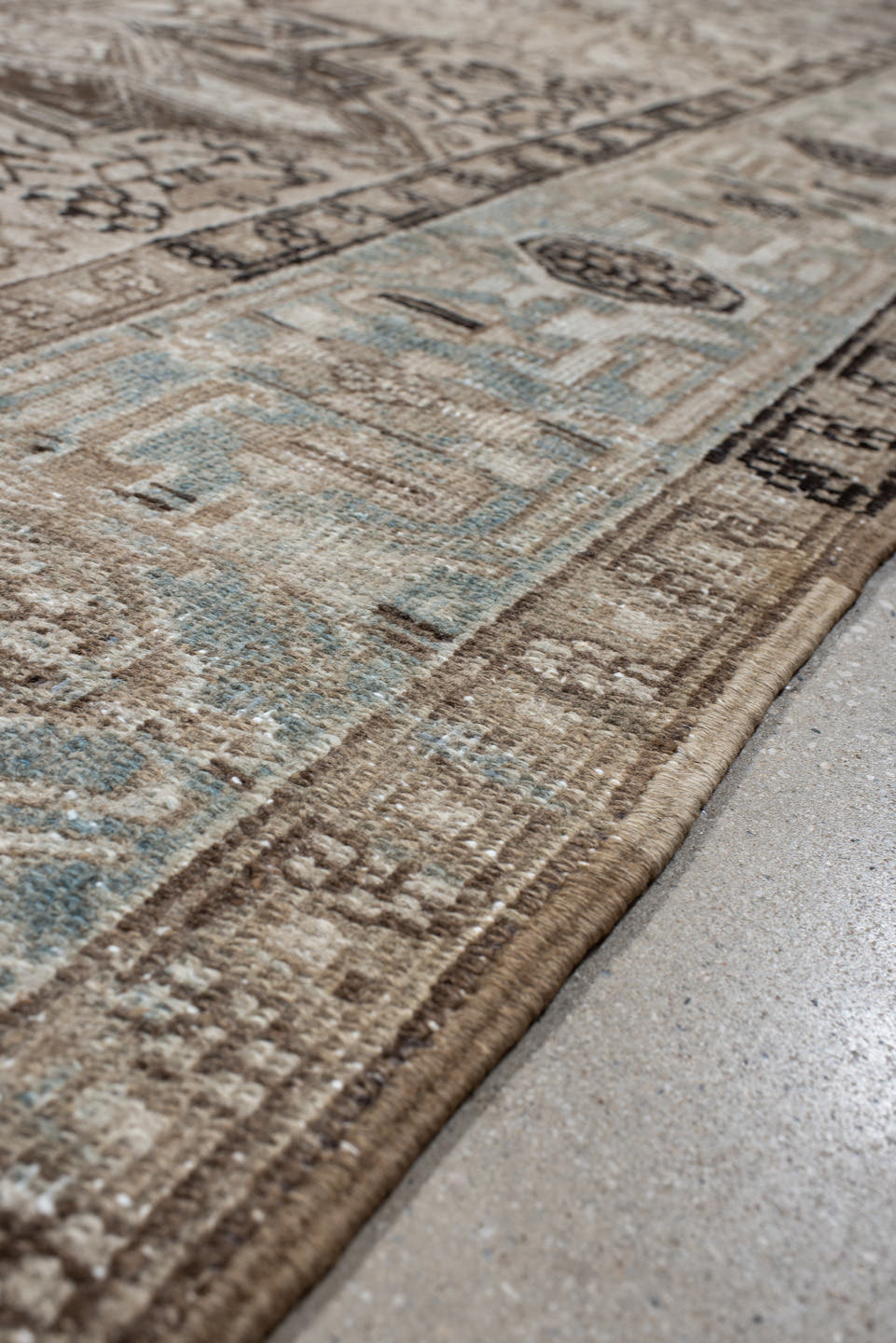 6' x 9' one-of-a-kind handmade vintage Heriz medium size rug. Color palette: taupe, ivory, light blue, charcoal, brown