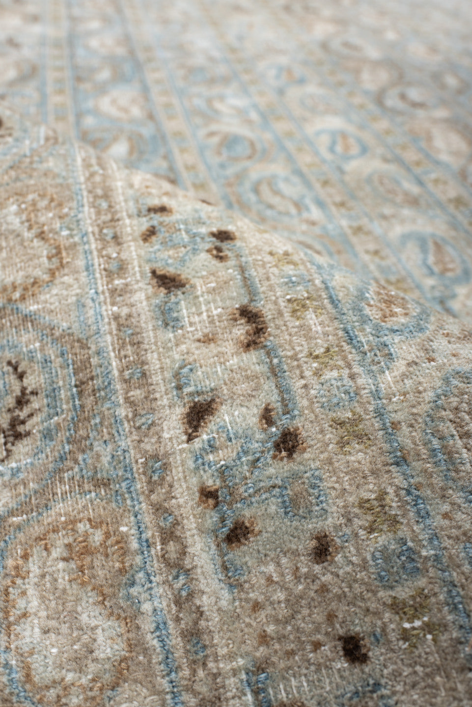 7' x 10' one-of-a-kind handmade antique Meshed large size rug. Color palette: ivory, light blue, taupe, beige, camel, brown