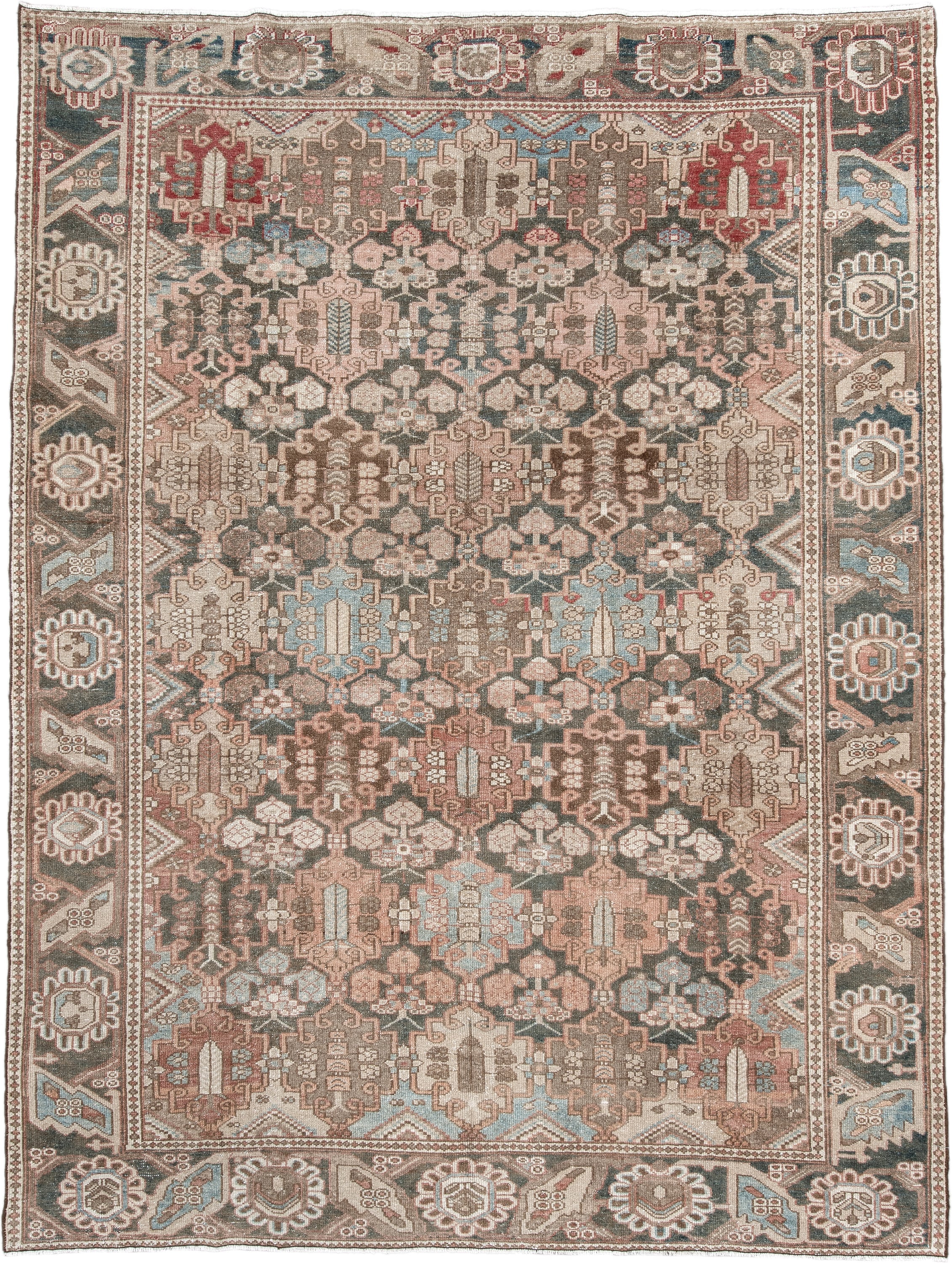 7' x 9' one-of-a-kind handmade vintage Baktiary rug. Color palette: taupe, charcoal, blush, ivory, sky blue, brown, rose