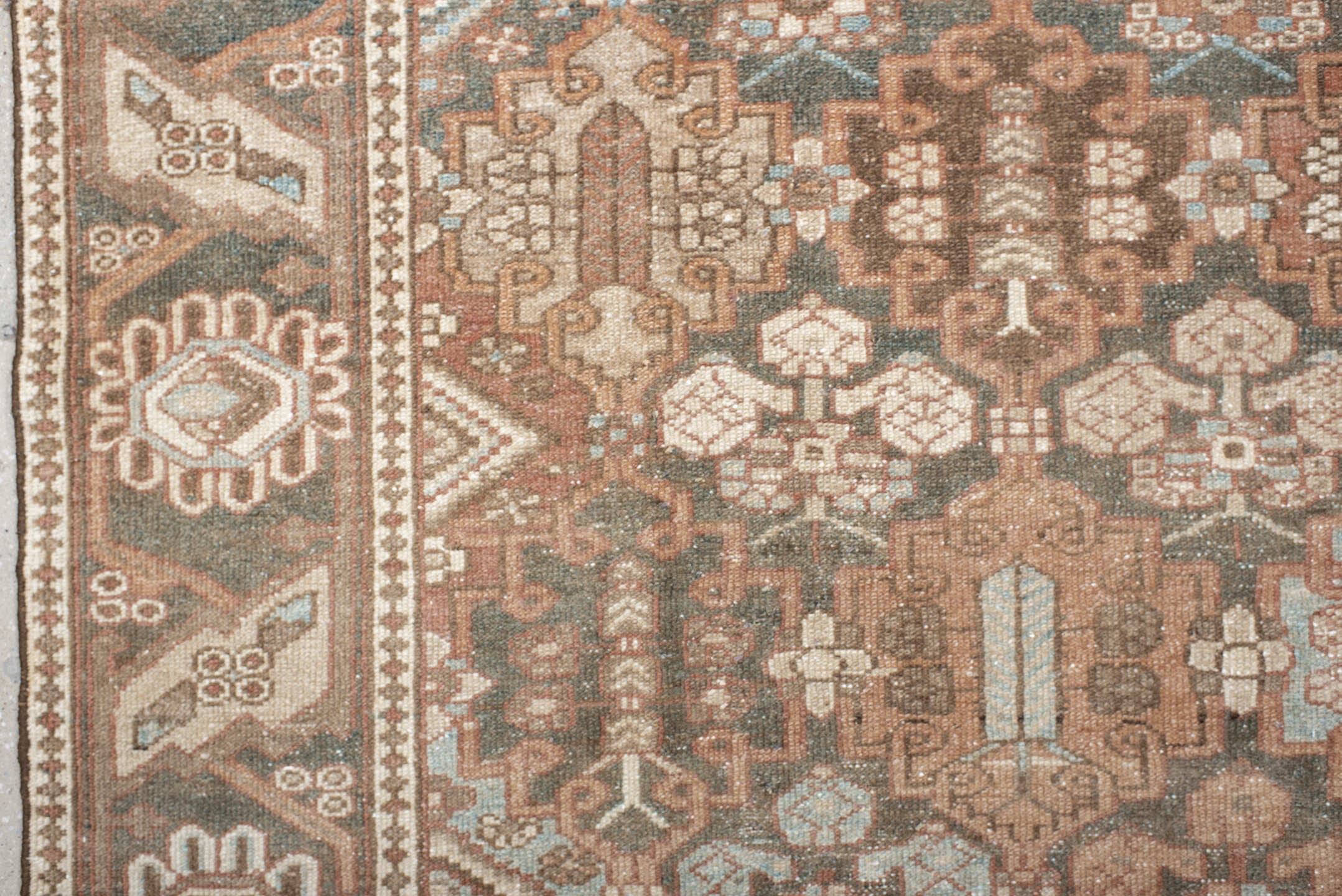 7' x 9' one-of-a-kind handmade vintage Baktiary rug. Color palette: taupe, charcoal, blush, ivory, sky blue, brown, rose
