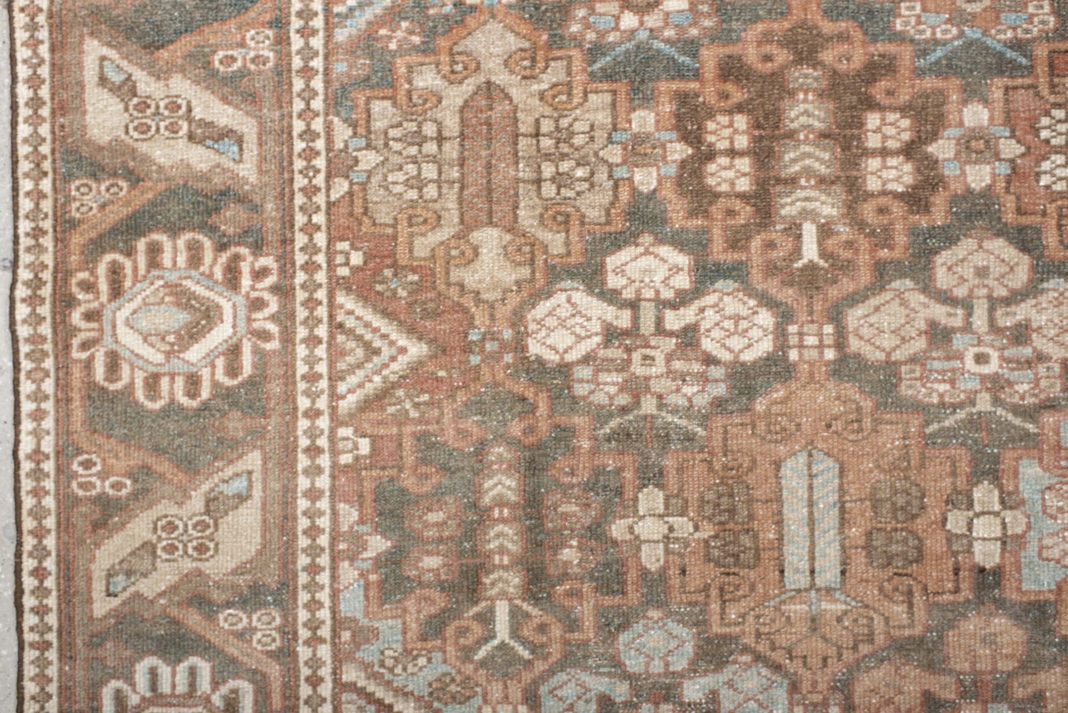 7' x 9' one-of-a-kind handmade vintage Baktiary rug. Color palette: taupe, charcoal, blush, ivory, sky blue, brown, rose