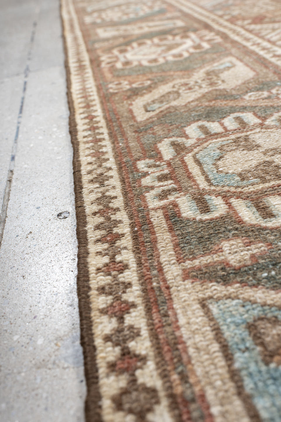 7' x 9' one-of-a-kind handmade vintage Baktiary rug. Color palette: taupe, charcoal, blush, ivory, sky blue, brown, rose