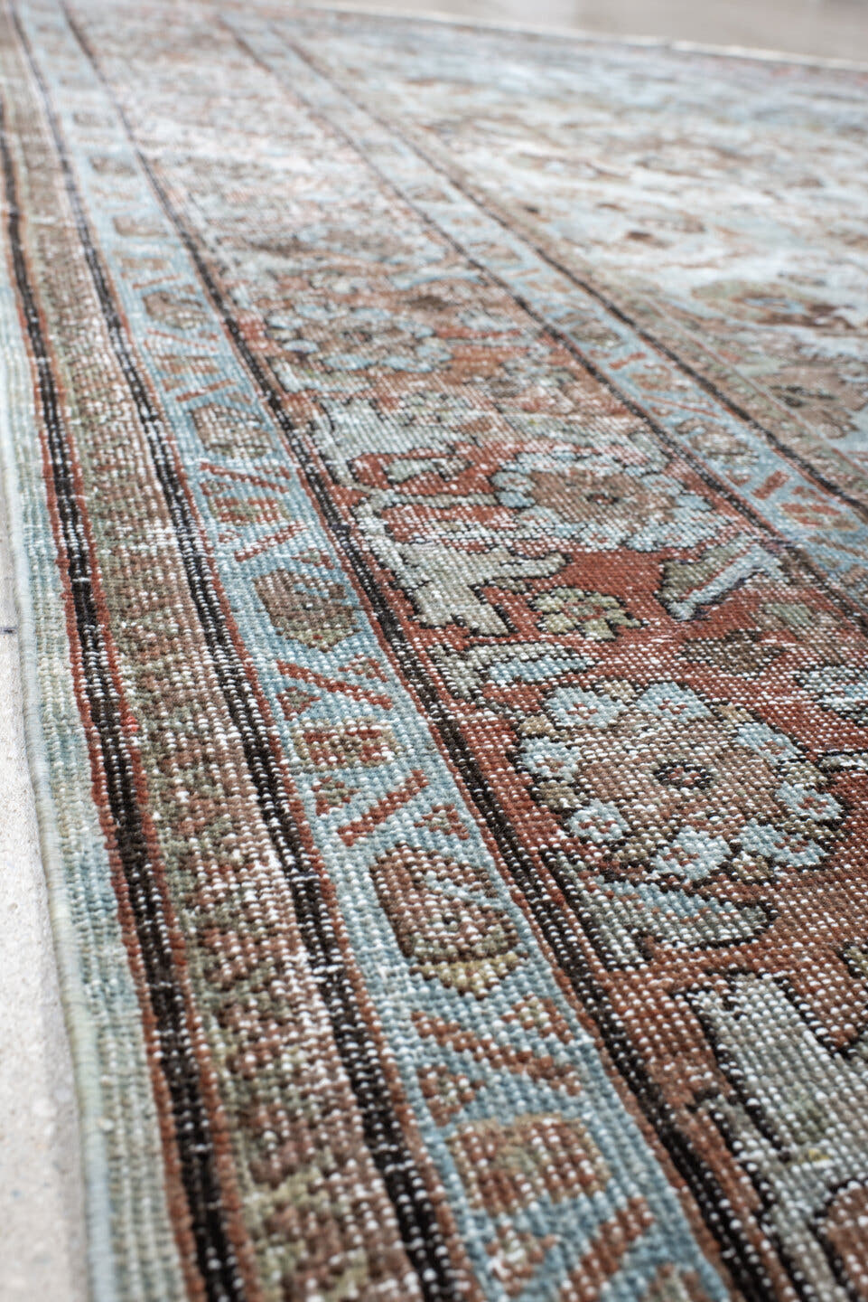 7' x 10' one-of-a-kind handmade vintage Mahal large size rug. Color palette: ivory, light blue, taupe, rust, brown, camel