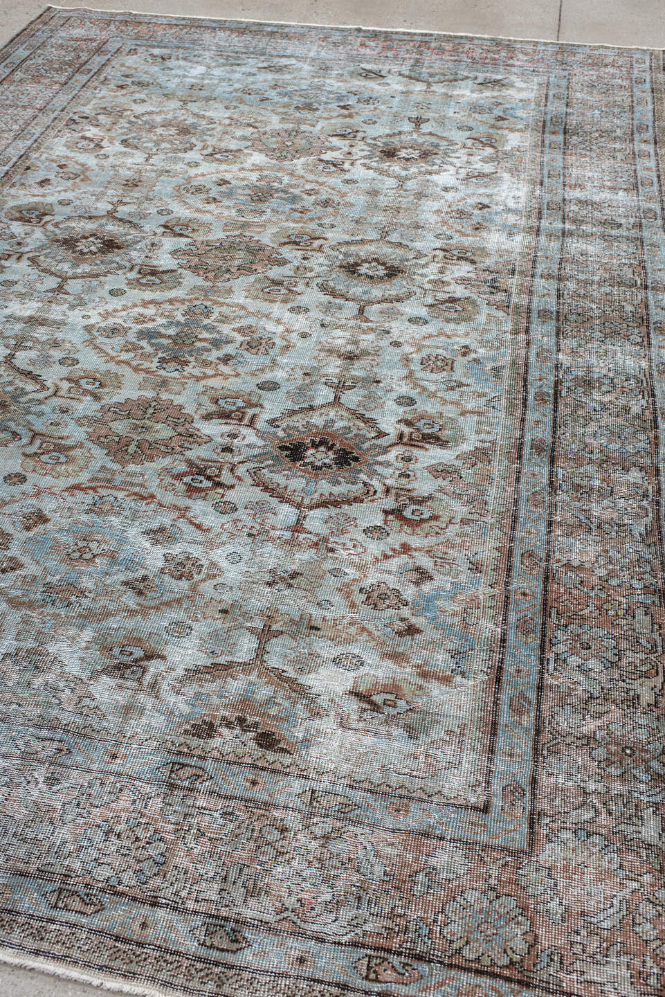 7' x 10' one-of-a-kind handmade vintage Mahal large size rug. Color palette: ivory, light blue, taupe, rust, brown, camel