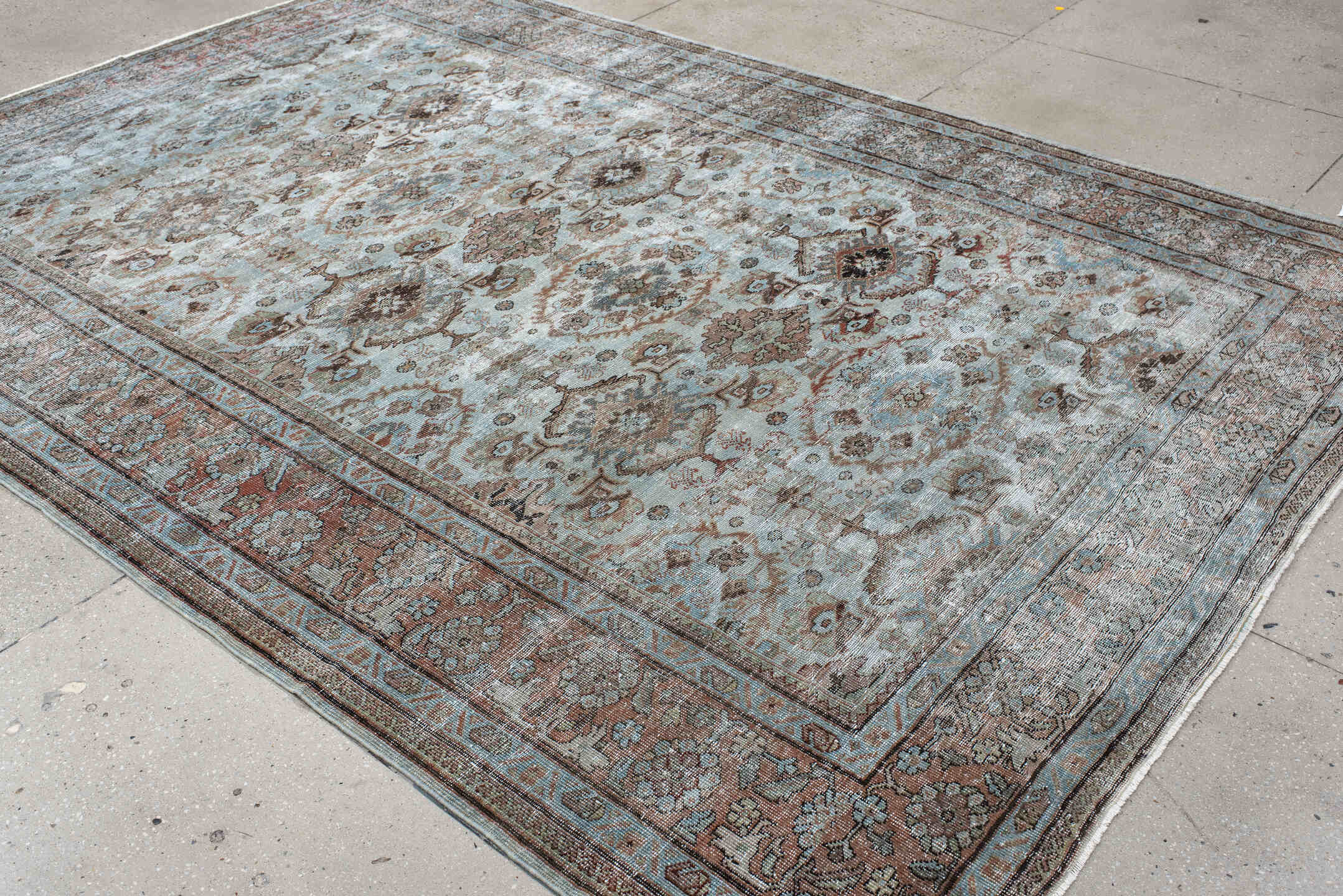7' x 10' one-of-a-kind handmade vintage Mahal large size rug. Color palette: ivory, light blue, taupe, rust, brown, camel