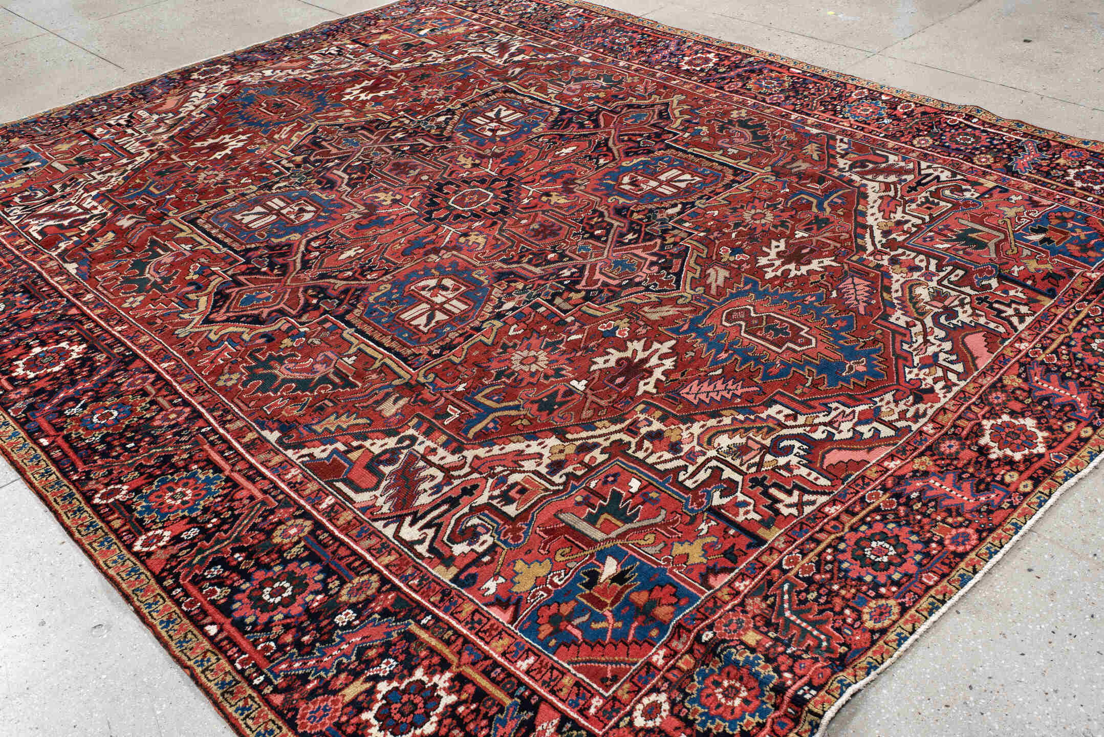 9' x 11' one-of-a-kind handmade vintage Heriz large size rug. Color palette: black, blue, brown, charcoal, fire brick, gray