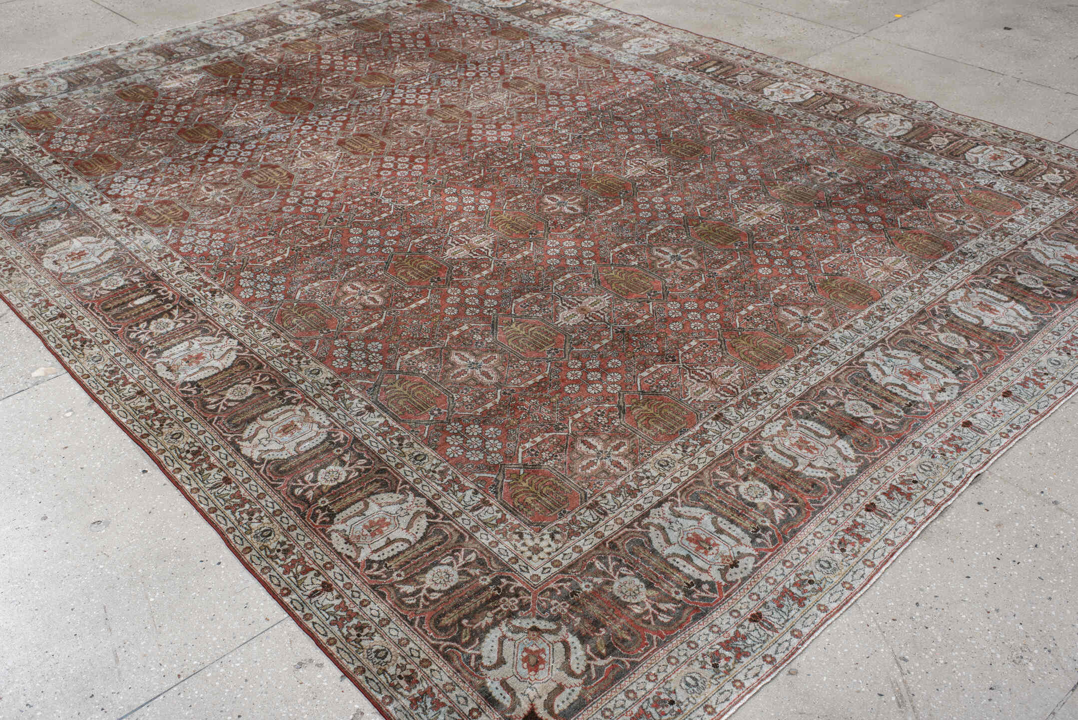 8' x 11' one-of-a-kind handmade antique Joshegan large size rug. Color palette: rust, ivory, slate, brown, gold, camel