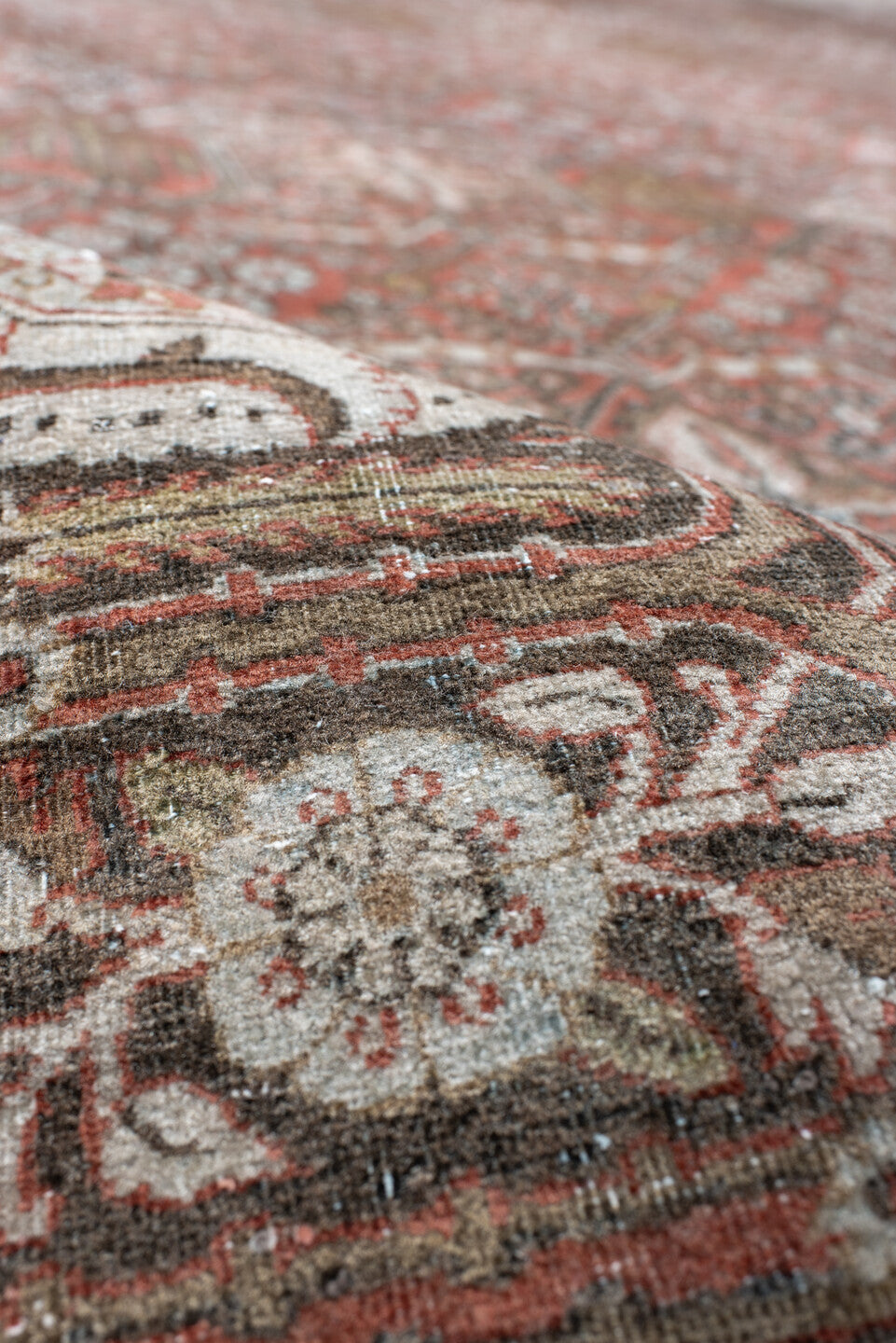 8' x 11' one-of-a-kind handmade antique Joshegan large size rug. Color palette: rust, ivory, slate, brown, gold, camel