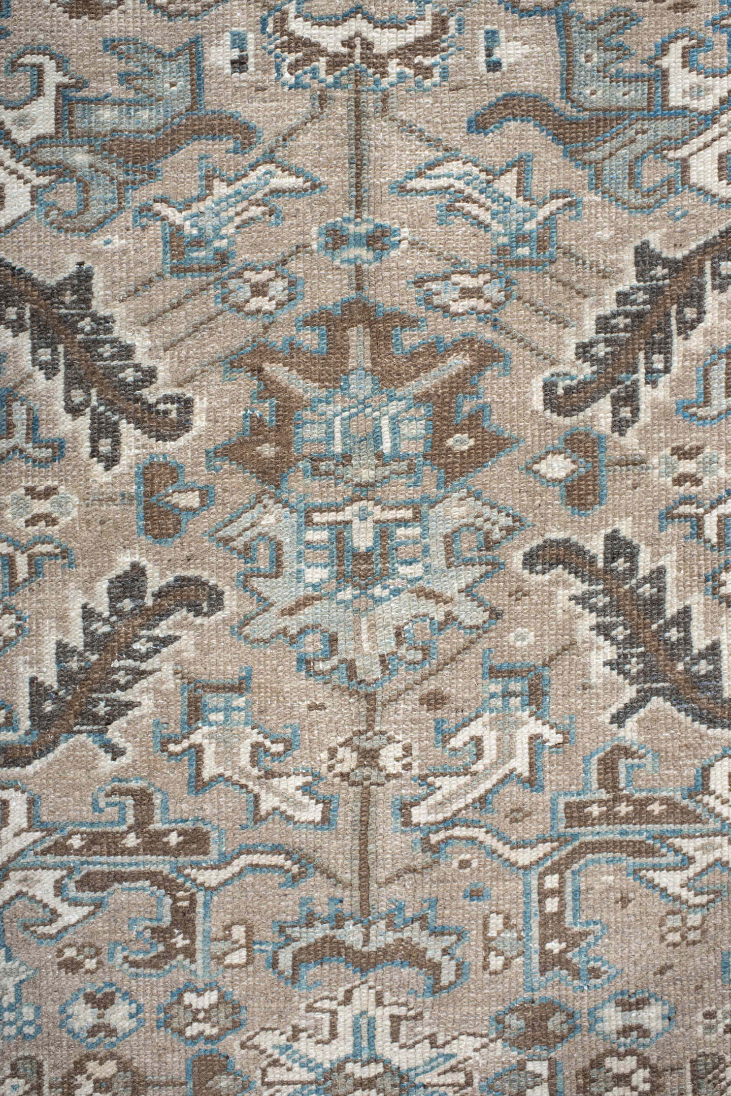 6' x 7' one-of-a-kind handmade antique Heriz rug. Color palette: taupe, brown, ivory, sky blue, charcoal, camel, beige, gray