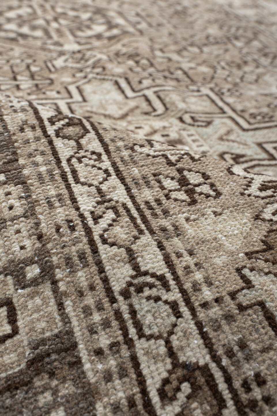 7' x 10' one-of-a-kind handmade vintage Karaje large size rug. Color palette: taupe, ivory, brown, rose, camel, charcoal