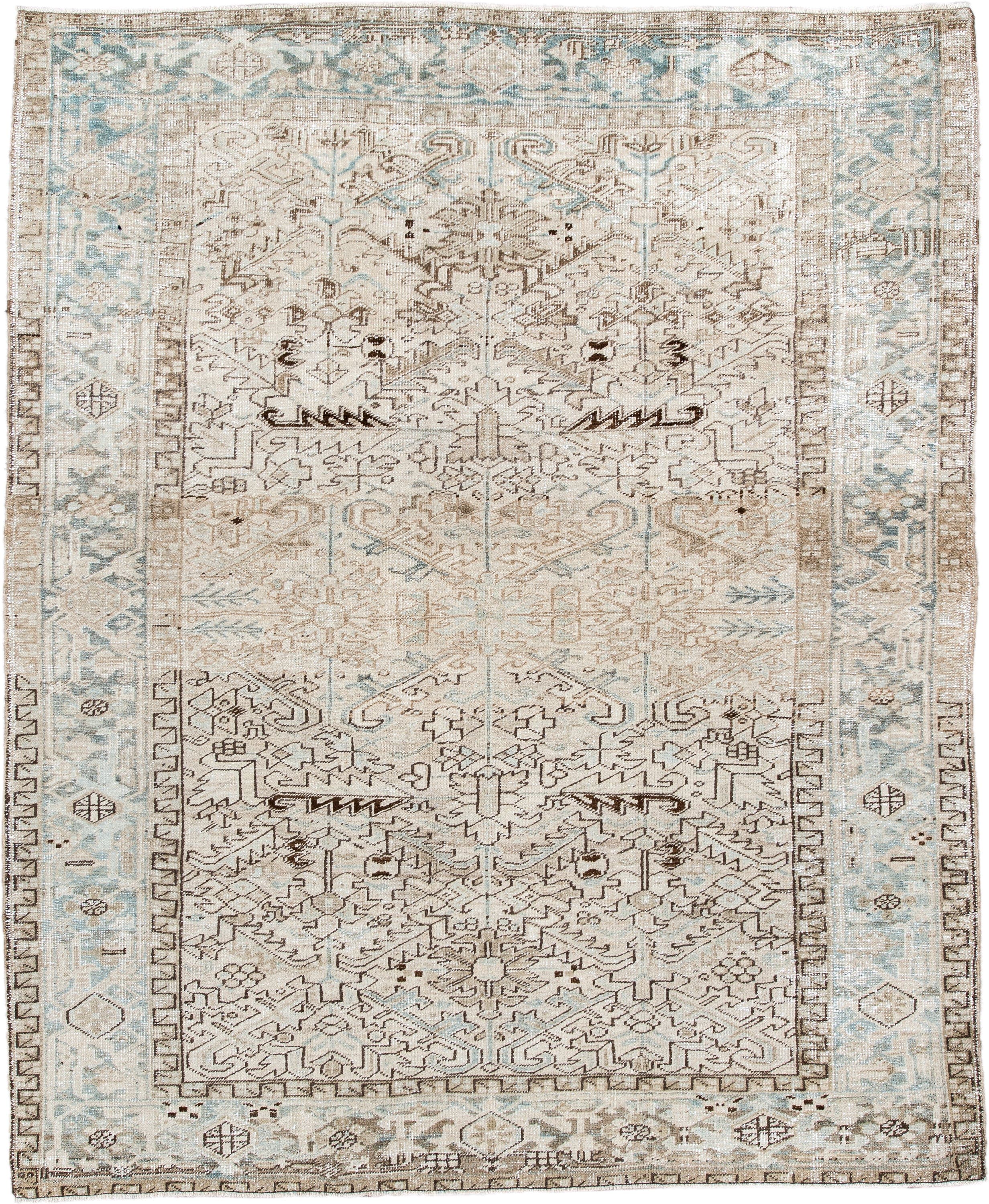 7' x 8' one-of-a-kind handmade antique Heriz rug. Color palette: ivory, pale blue, taupe, brown, cream, light blue, beige