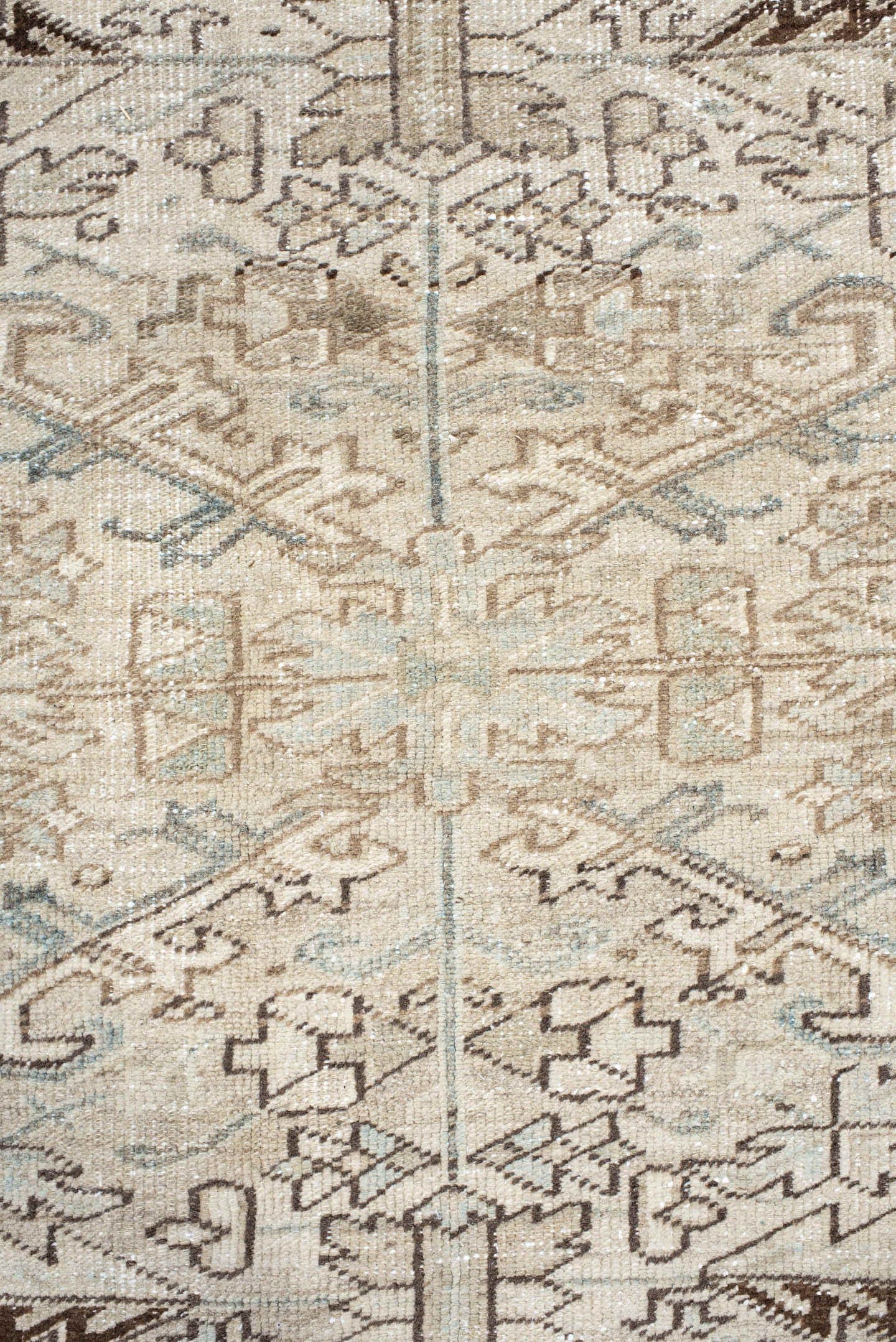 7' x 8' one-of-a-kind handmade antique Heriz rug. Color palette: ivory, pale blue, taupe, brown, cream, light blue, beige