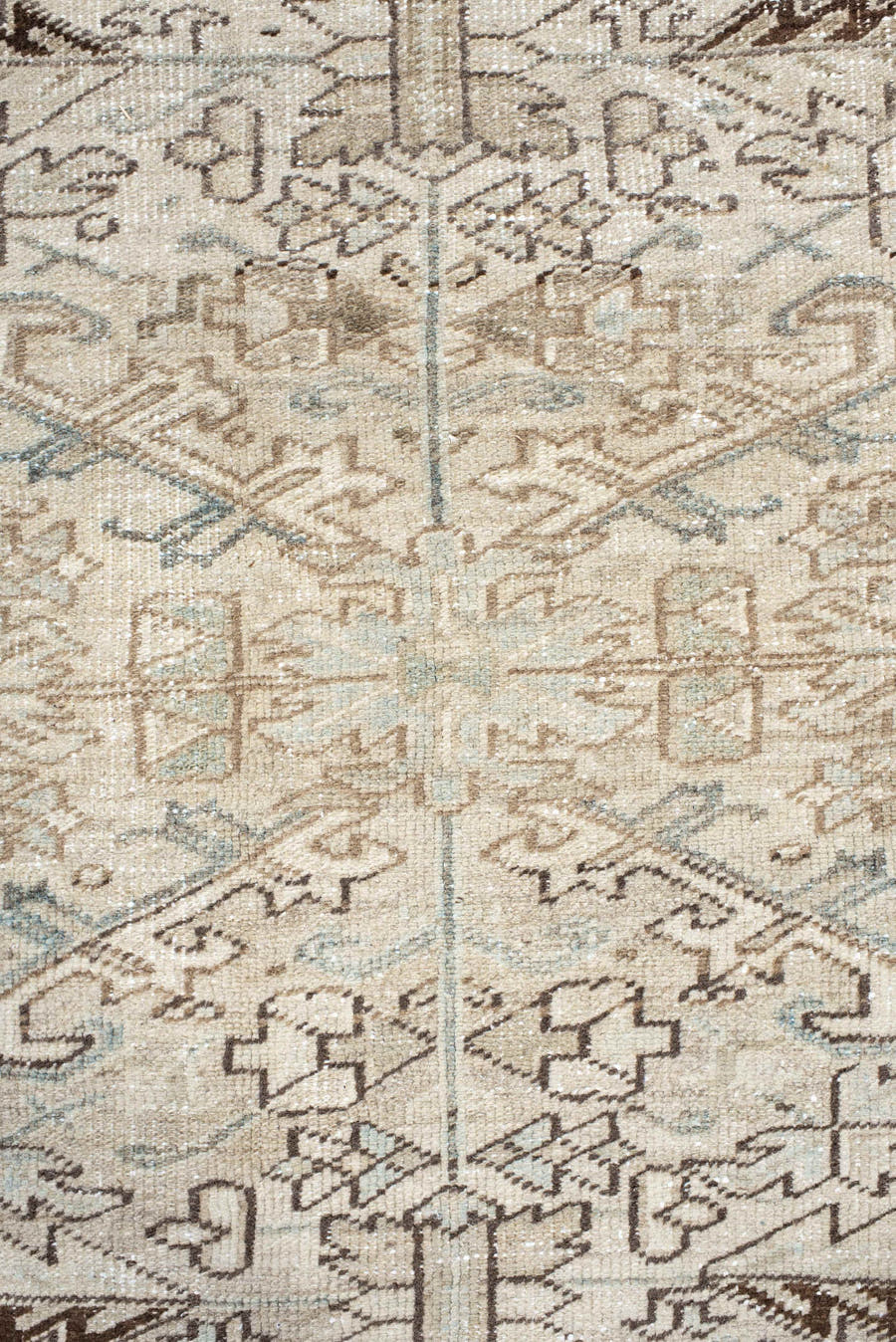 7' x 8' one-of-a-kind handmade antique Heriz rug. Color palette: ivory, pale blue, taupe, brown, cream, light blue, beige