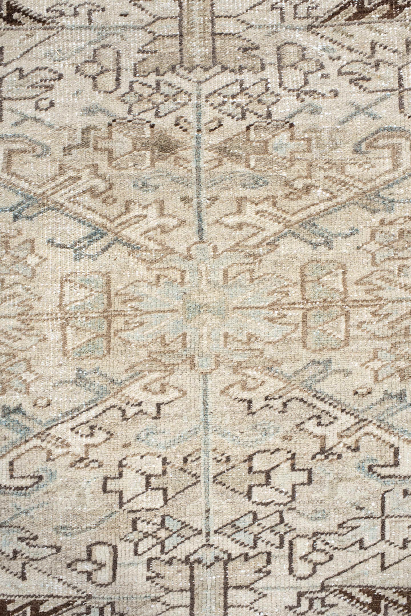 7' x 8' one-of-a-kind handmade antique Heriz rug. Color palette: ivory, pale blue, taupe, brown, cream, light blue, beige