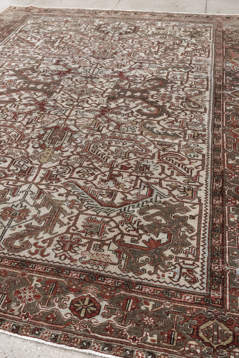 8' x 10' one-of-a-kind handmade vintage Heriz large size rug. Color palette: ivory, taupe, rust, charcoal, terra cotta