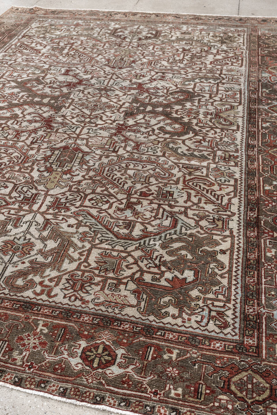 8' x 10' one-of-a-kind handmade vintage Heriz large size rug. Color palette: ivory, taupe, rust, charcoal, terra cotta