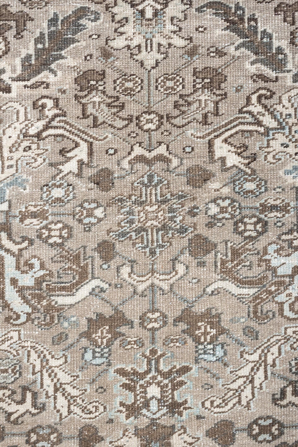 7' x 9' one-of-a-kind handmade vintage Heriz rug. Color palette: taupe, brown, ivory, pale blue, camel, charcoal, beige
