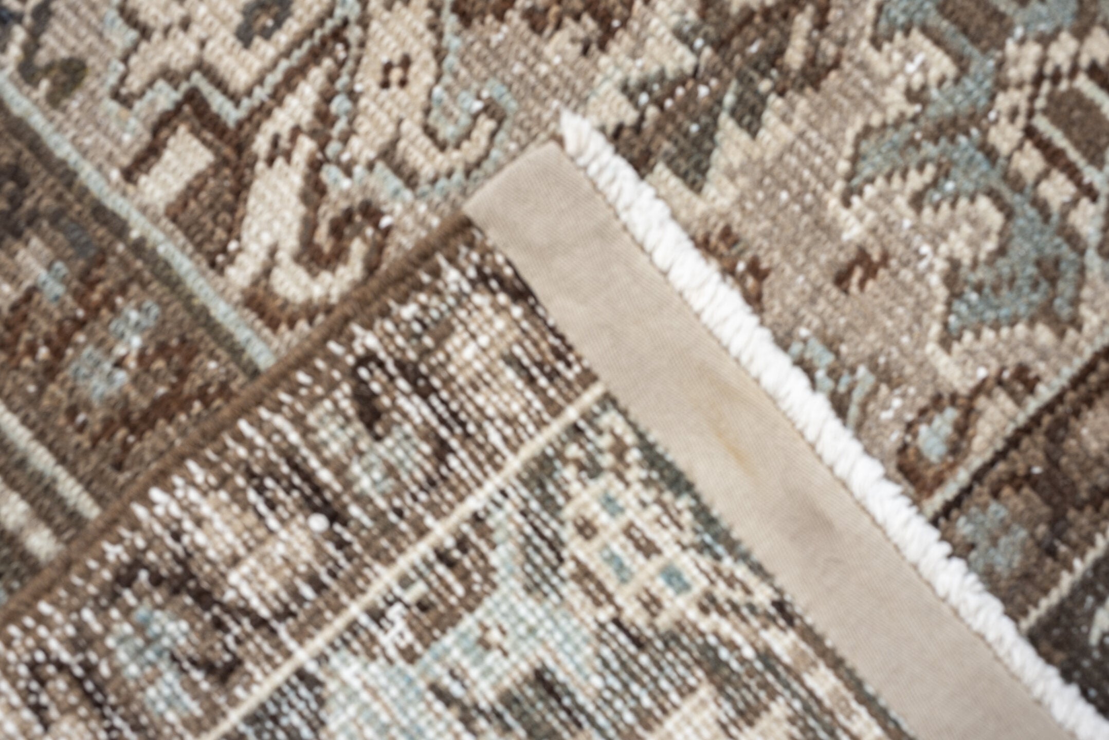 7' x 9' one-of-a-kind handmade vintage Heriz rug. Color palette: taupe, brown, ivory, pale blue, camel, charcoal, beige