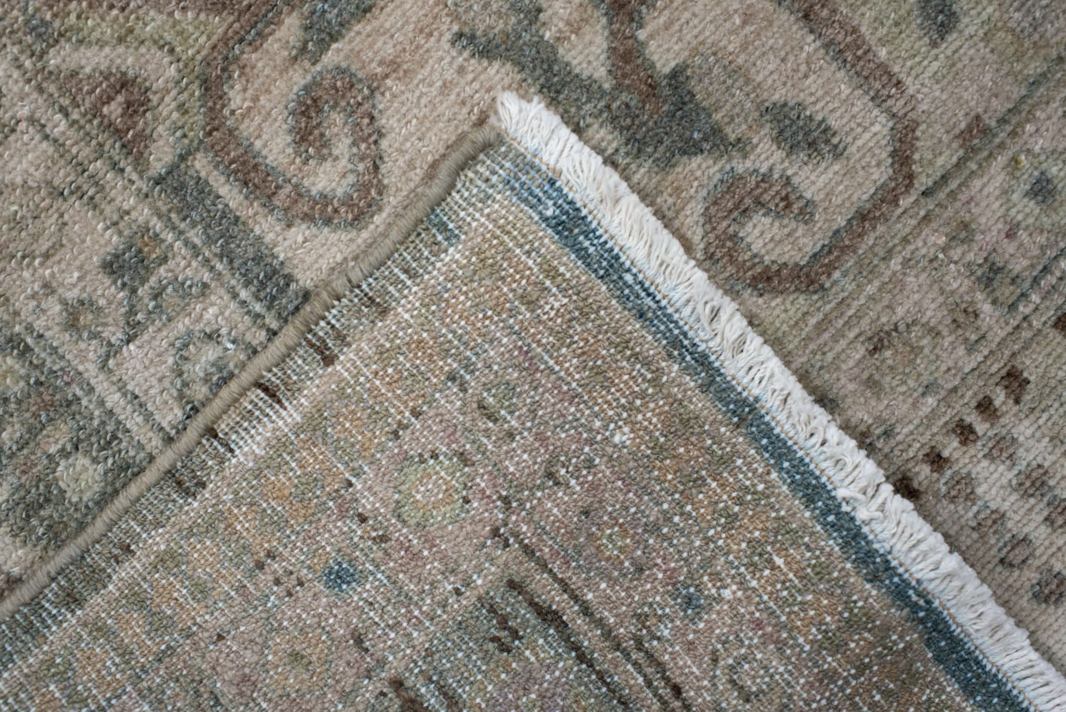 5' x 9' one-of-a-kind handmade antique Malayer medium size rug. Color palette: ivory, taupe, pale blue, beige, camel