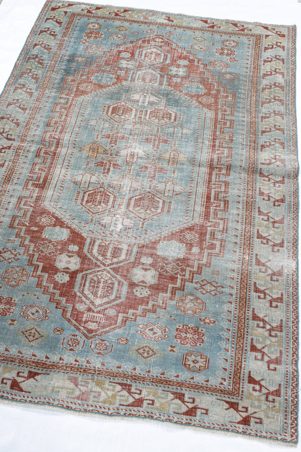 3' x 4' one-of-a-kind handmade antique Shirvan small size rug. Color palette: pale blue, rust, ivory, sage, taupe