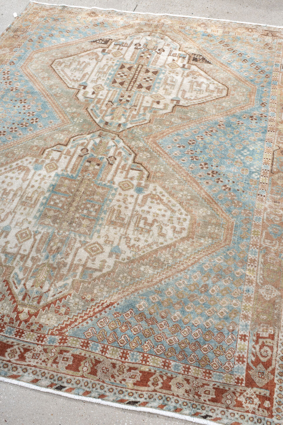 5' x 6' one-of-a-kind handmade antique Afshar rug. Color palette: sky blue, ivory, rust, blush, taupe, camel, brown