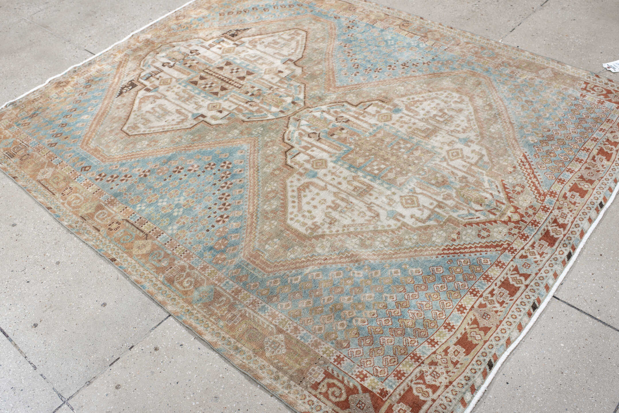5' x 6' one-of-a-kind handmade antique Afshar rug. Color palette: sky blue, ivory, rust, blush, taupe, camel, brown