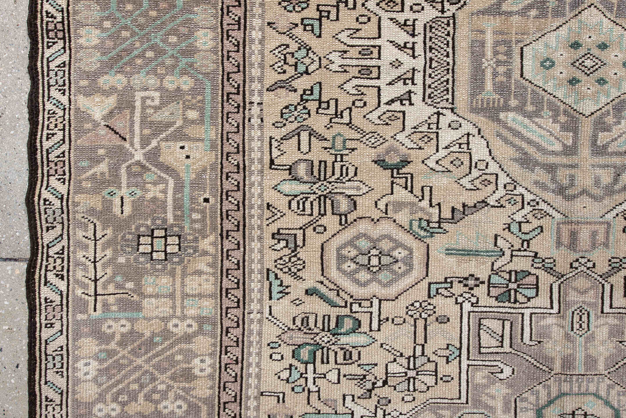 5' x 6' one-of-a-kind handmade vintage Karaje rug. Color palette: ivory, taupe, charcoal, aqua, gray, cream, beige, black