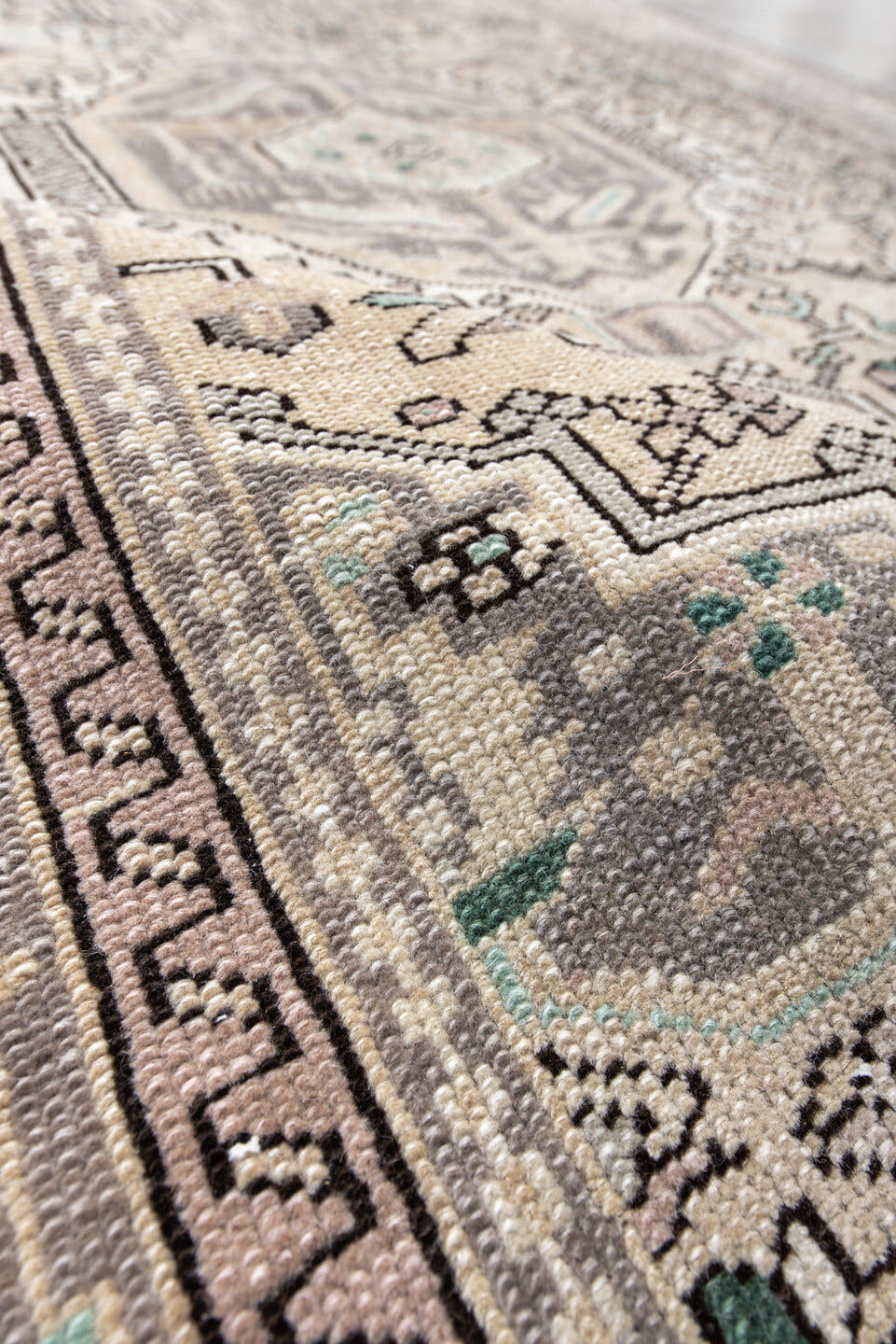 5' x 6' one-of-a-kind handmade vintage Karaje rug. Color palette: ivory, taupe, charcoal, aqua, gray, cream, beige, black