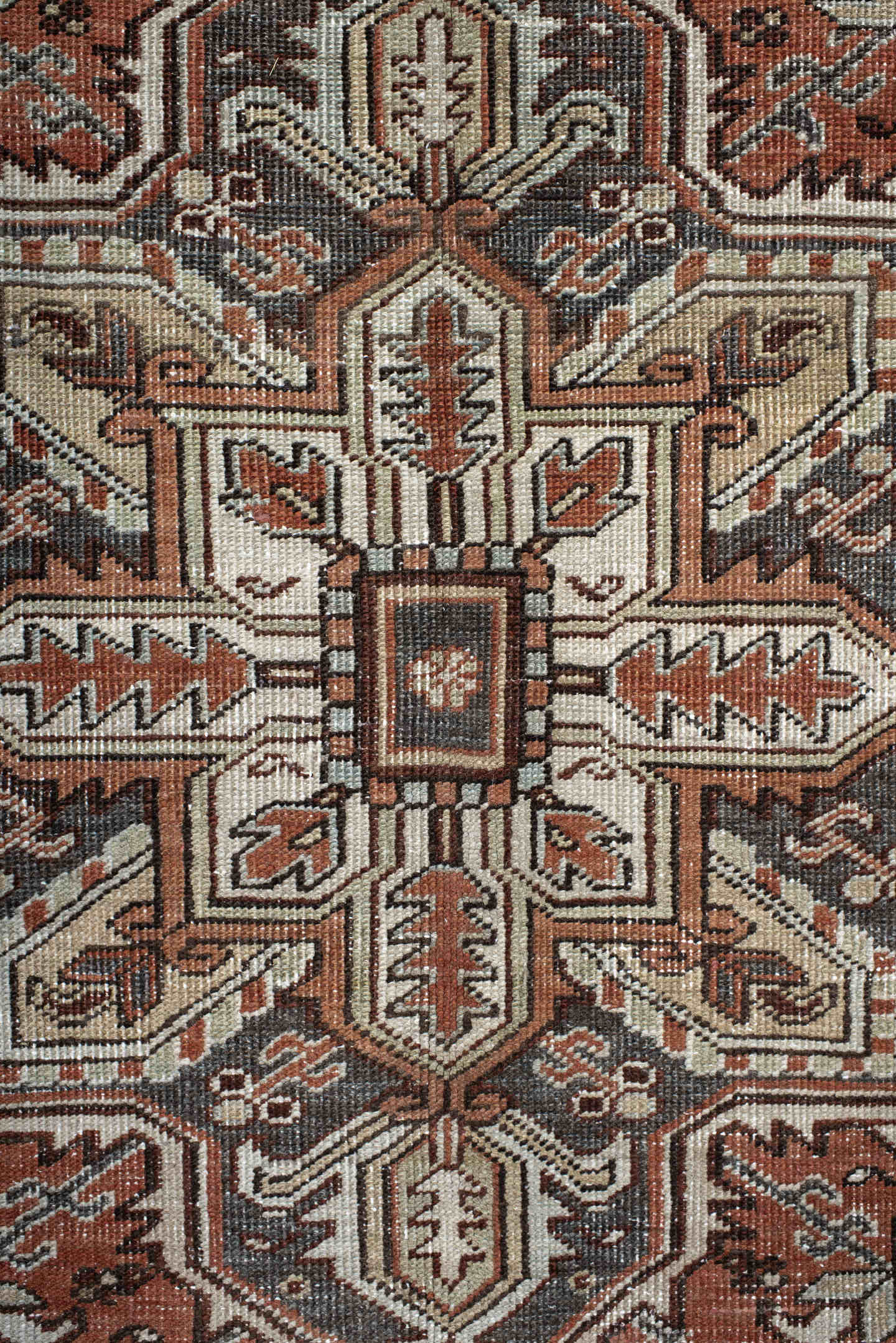 6' x 9' one-of-a-kind handmade antique Heriz medium size rug. Color palette: rust, ivory, navy, charcoal, camel, terra cotta