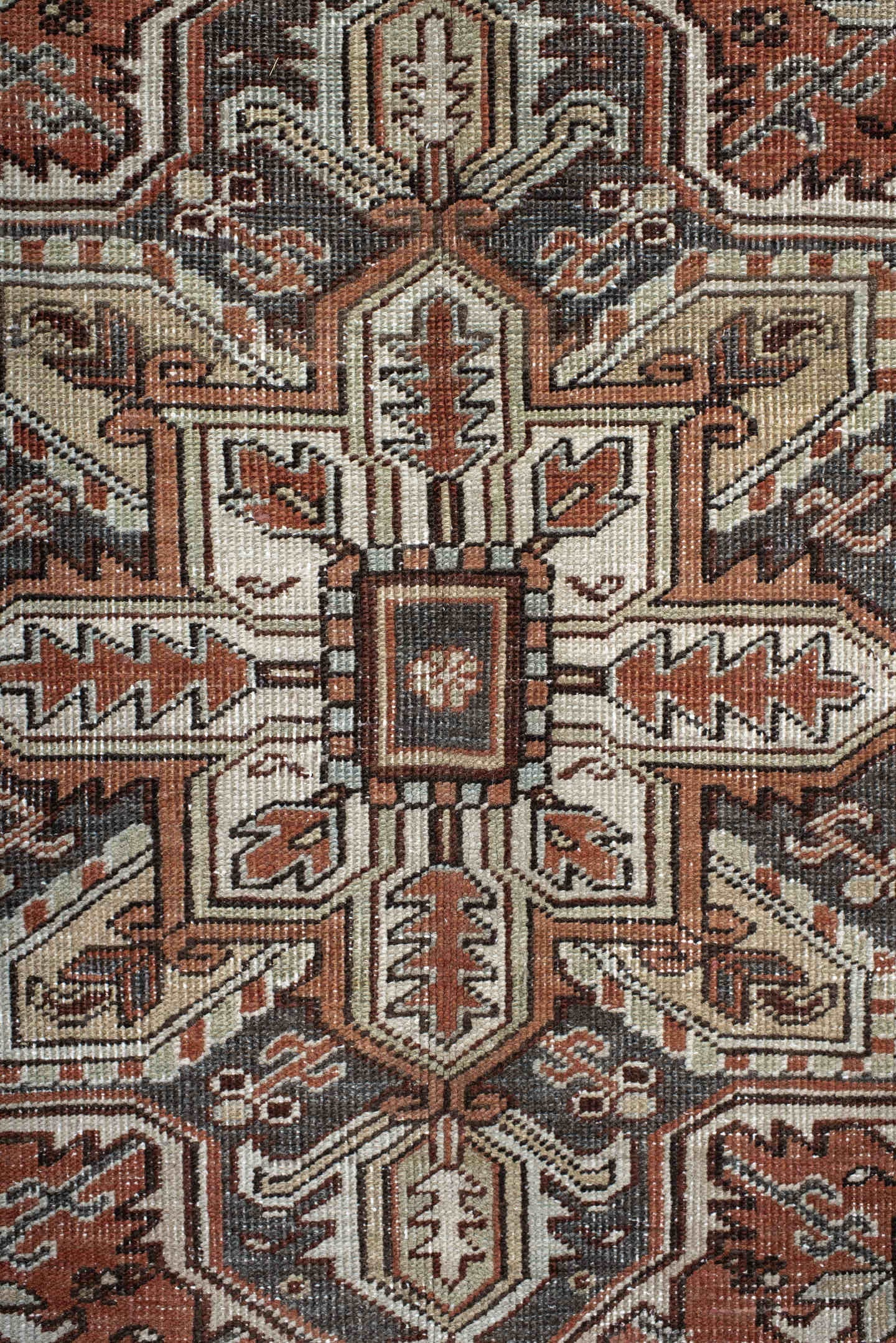 6' x 9' one-of-a-kind handmade antique Heriz medium size rug. Color palette: rust, ivory, navy, charcoal, camel, terra cotta