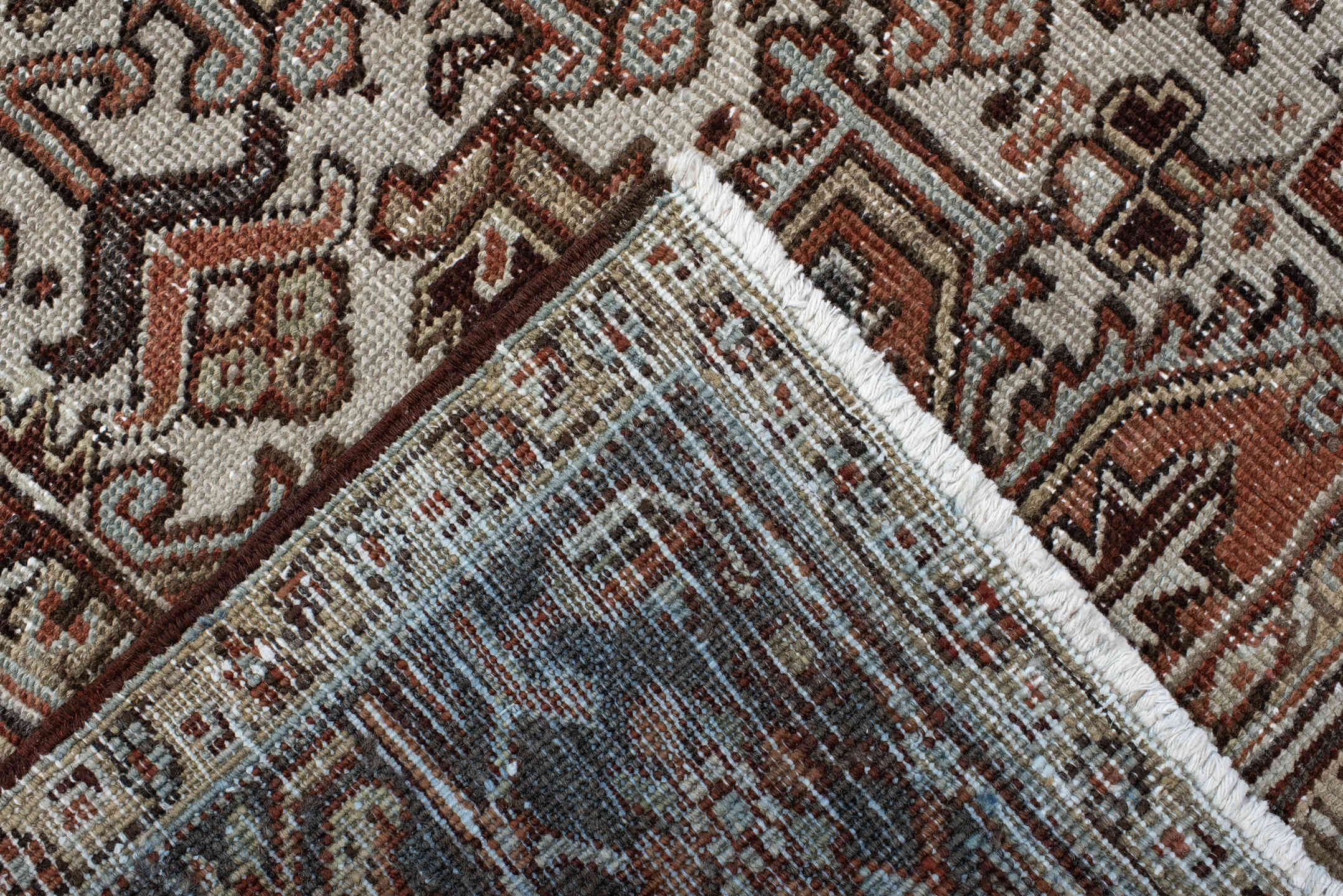 6' x 9' one-of-a-kind handmade antique Heriz medium size rug. Color palette: rust, ivory, navy, charcoal, camel, terra cotta