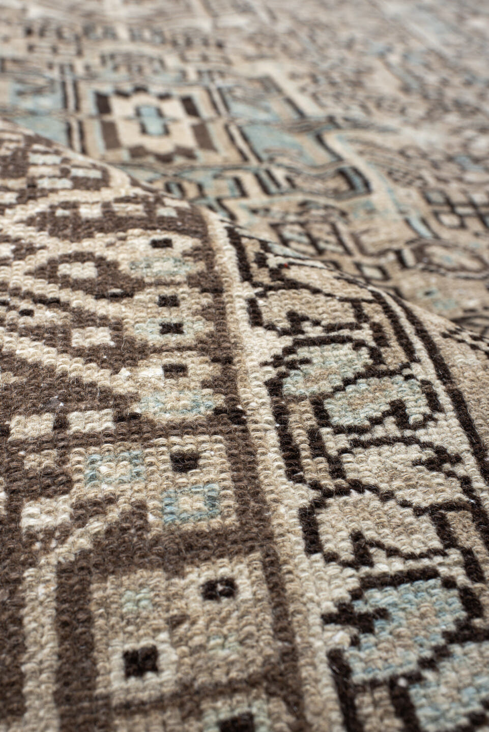 7' x 11' one-of-a-kind handmade antique Karaje large size rug. Color palette: ivory, brown, sky blue, taupe, camel