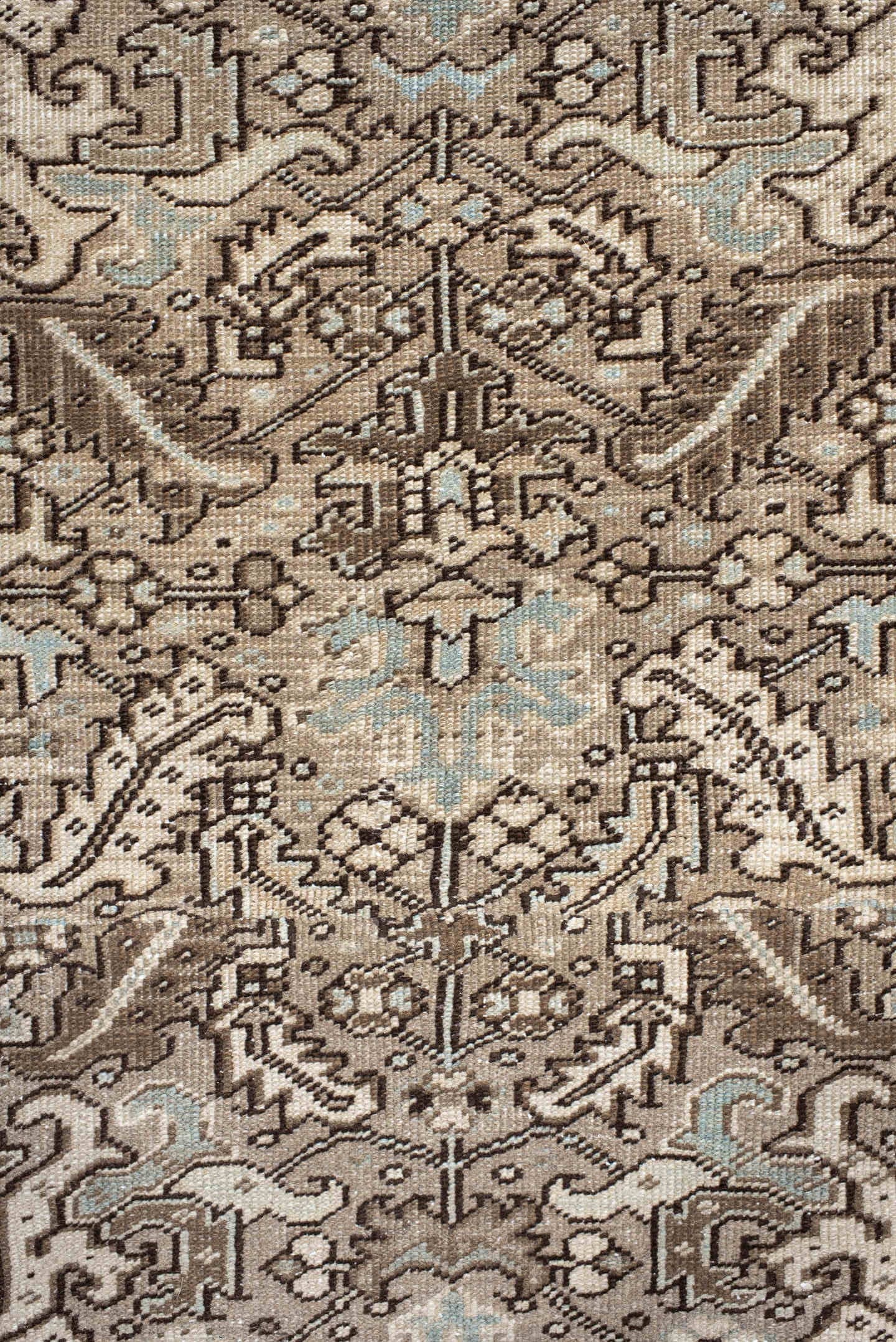 7' x 8' one-of-a-kind handmade antique Heriz rug. Color palette: ivory, taupe, brown, camel, pale blue, charcoal, beige