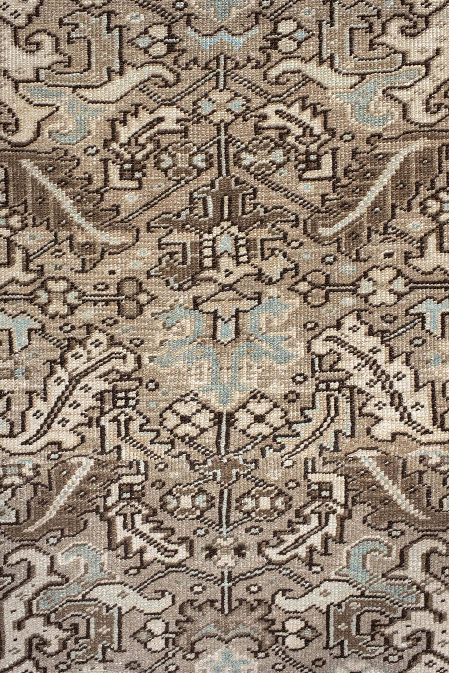 7' x 8' one-of-a-kind handmade antique Heriz rug. Color palette: ivory, taupe, brown, camel, pale blue, charcoal, beige