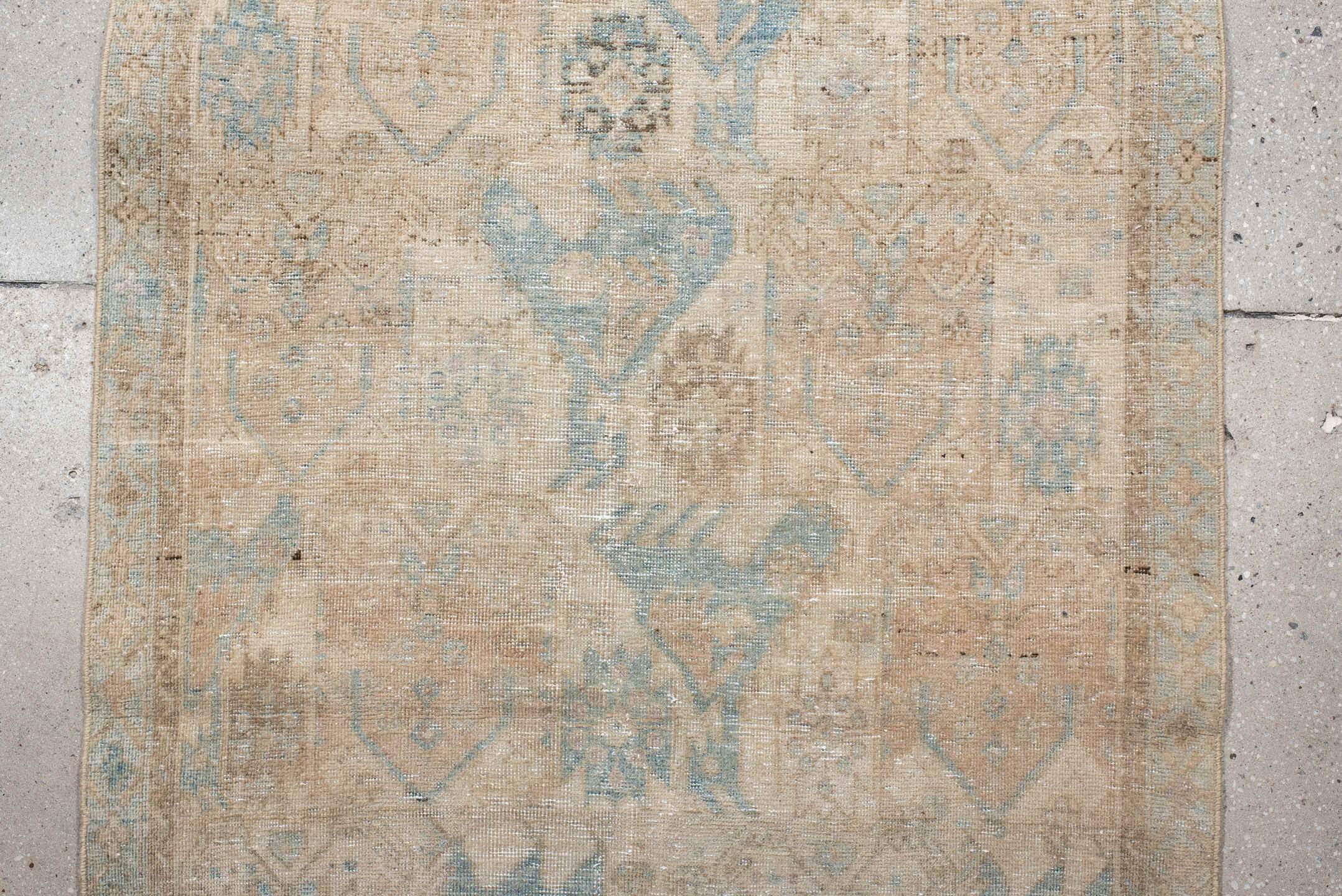 3' x 11' one-of-a-kind handmade antique Sarab runner rug. Color palette: ivory, beige, pale blue, taupe, camel, brown