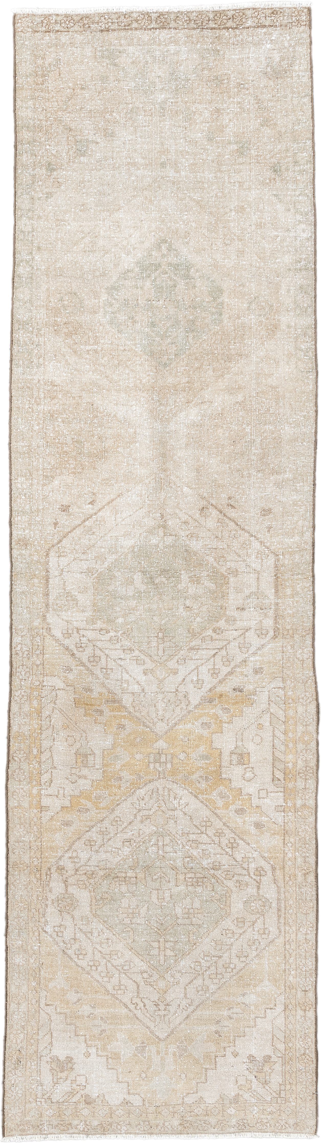 2' x 10' one-of-a-kind handmade vintage Karaje runner rug. Color palette: ivory, sand, cream, pale gold, taupe, sage, beige