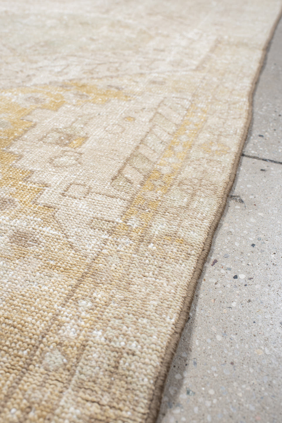 2' x 10' one-of-a-kind handmade vintage Karaje runner rug. Color palette: ivory, sand, cream, pale gold, taupe, sage, beige