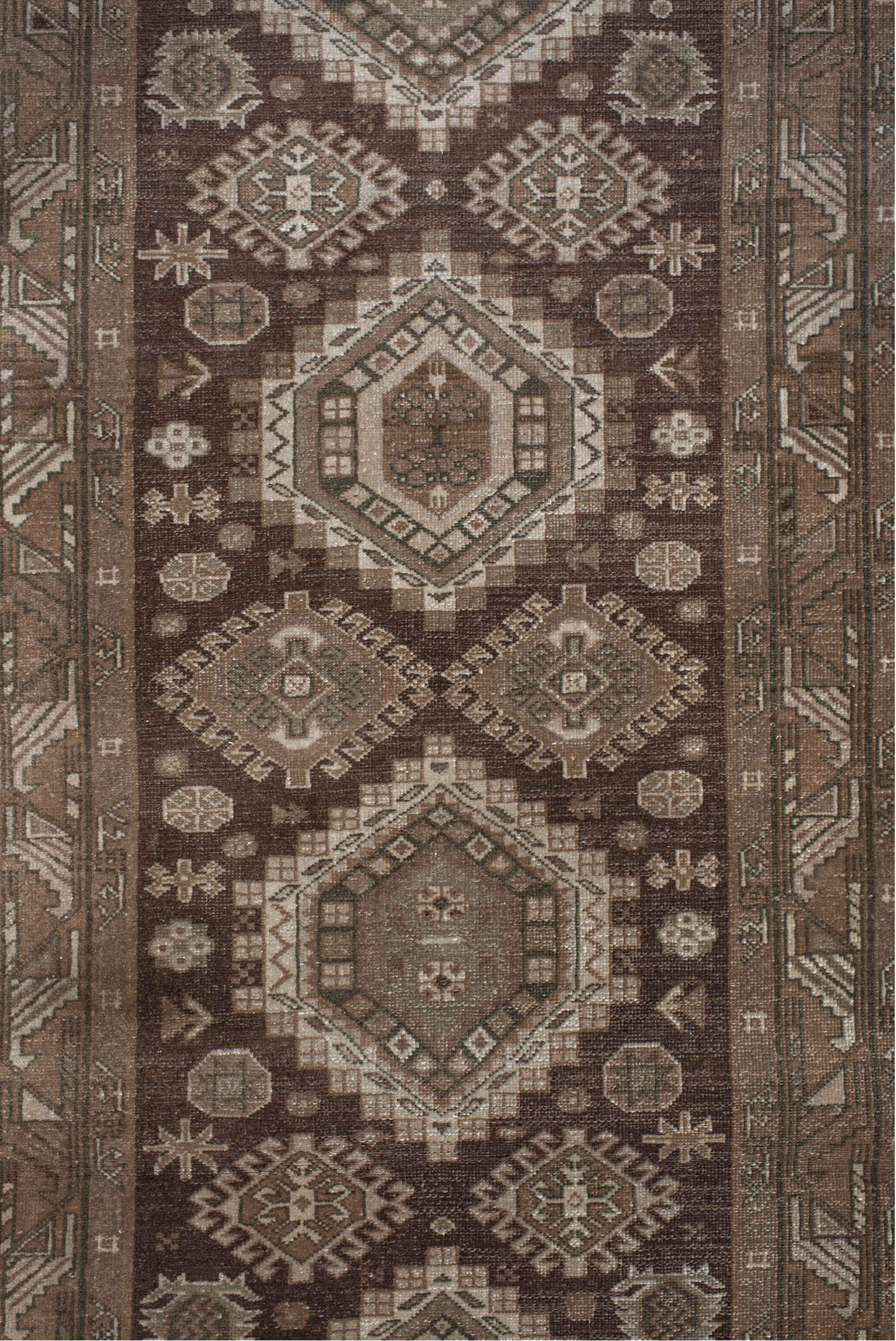 2' x 10' one-of-a-kind handmade vintage Sivas runner rug. Color palette: brown, gray, light gray, off-white, pink