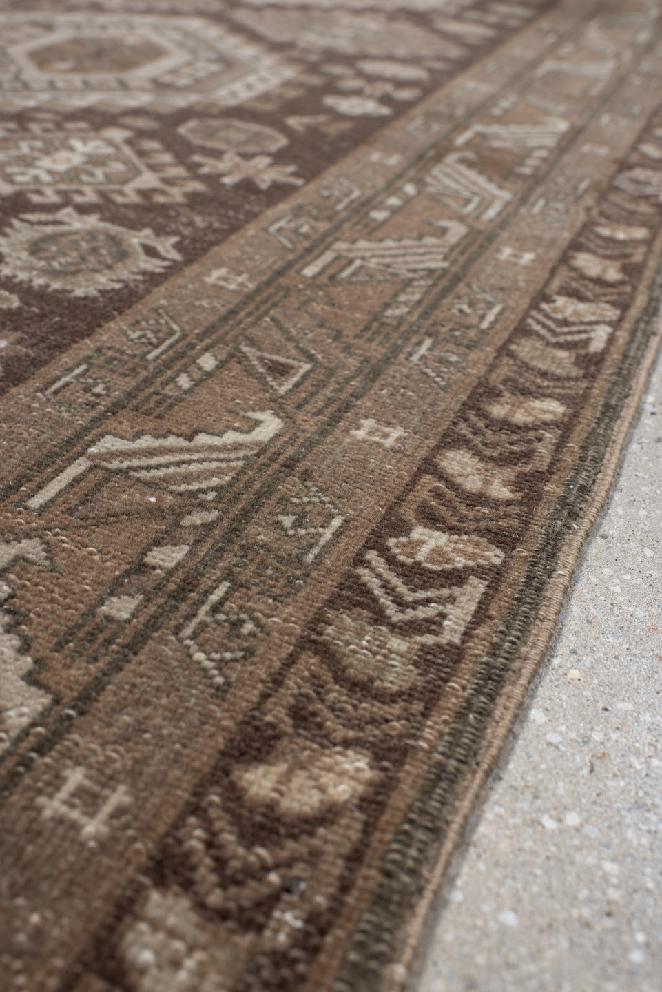 2' x 10' one-of-a-kind handmade vintage Sivas runner rug. Color palette: brown, gray, light gray, off-white, pink