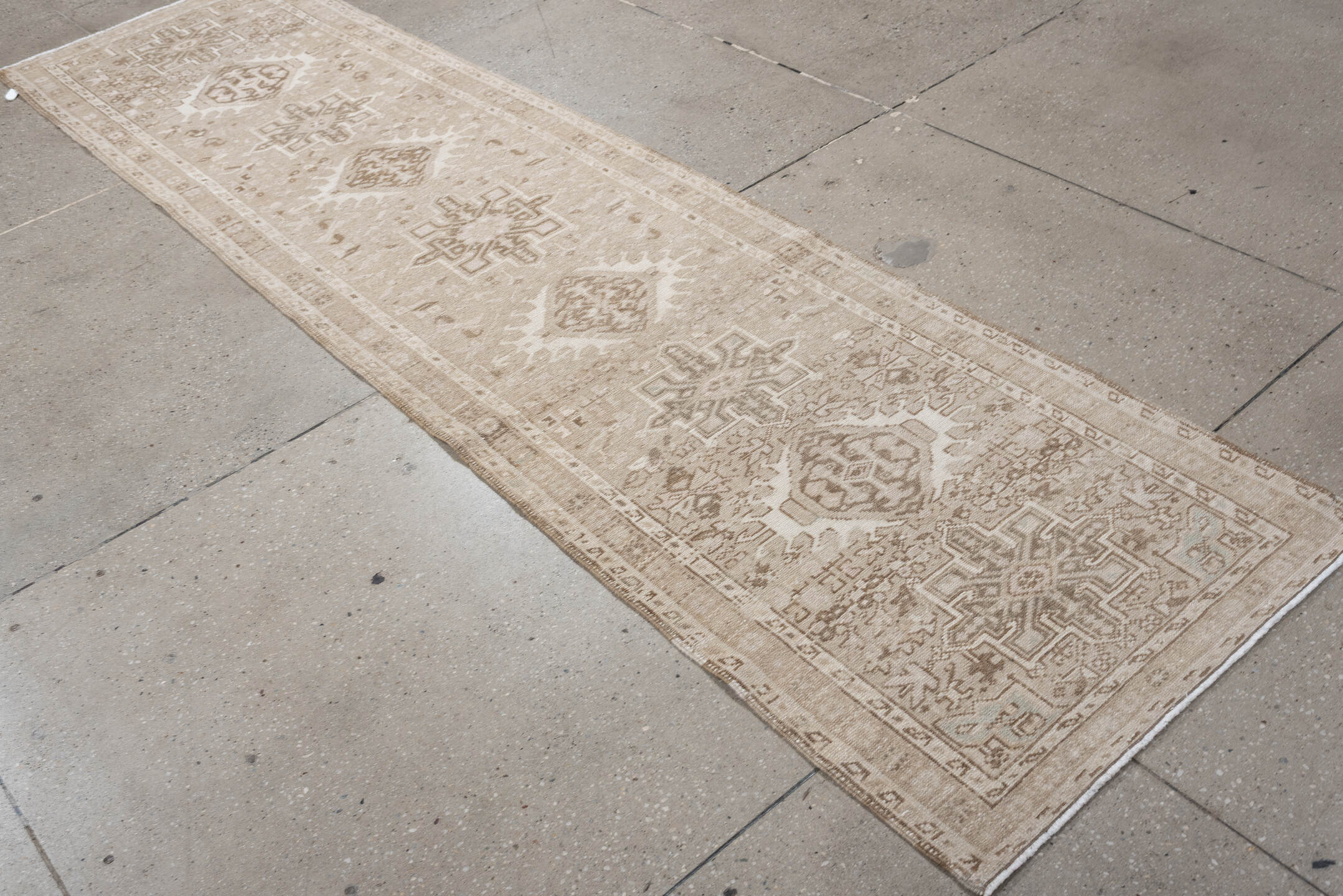 2' x 9' one-of-a-kind handmade antique Karaje runner rug. Color palette: ivory, taupe, sand, beige, camel, light brown, gray