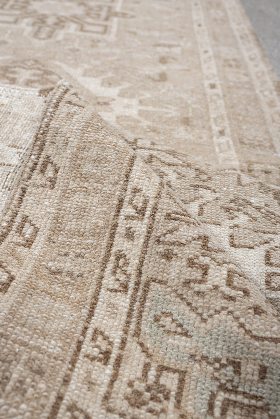 2' x 9' one-of-a-kind handmade antique Karaje runner rug. Color palette: ivory, taupe, sand, beige, camel, light brown, gray