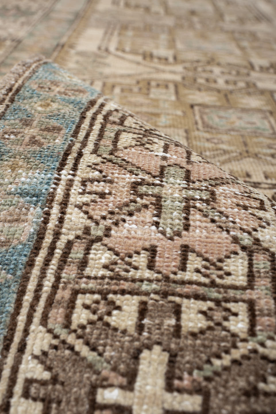 3' x 10' one-of-a-kind handmade antique Sarab runner rug. Color palette: ivory, sky blue, taupe, camel, brown, blush