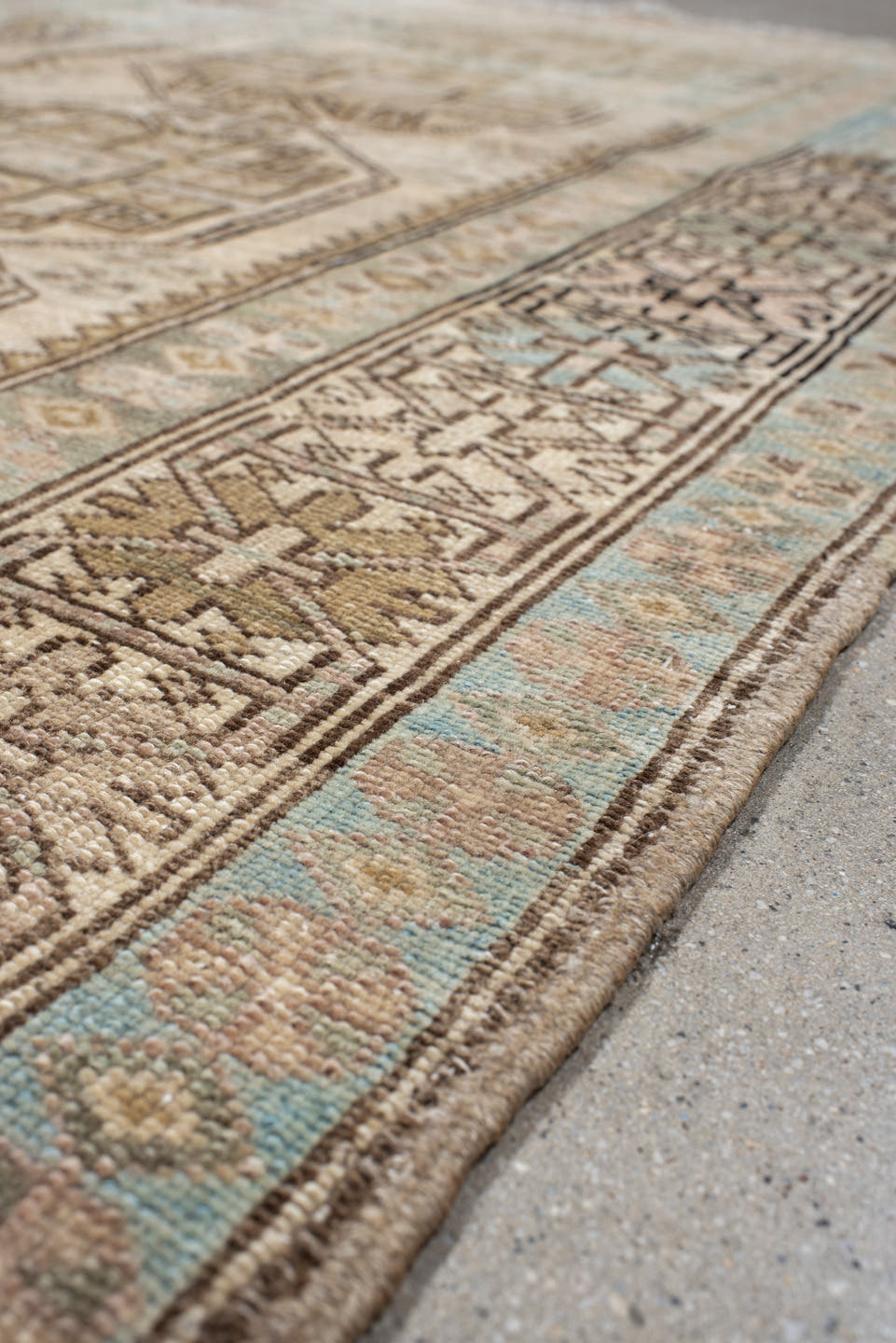 3' x 10' one-of-a-kind handmade antique Sarab runner rug. Color palette: ivory, sky blue, taupe, camel, brown, blush