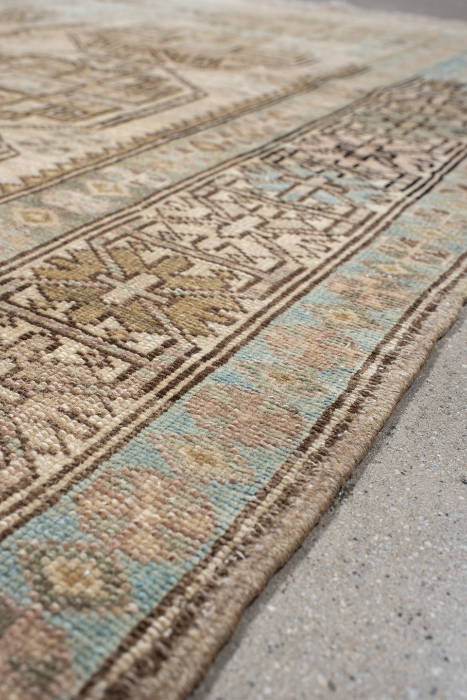 3' x 10' one-of-a-kind handmade antique Sarab runner rug. Color palette: ivory, sky blue, taupe, camel, brown, blush
