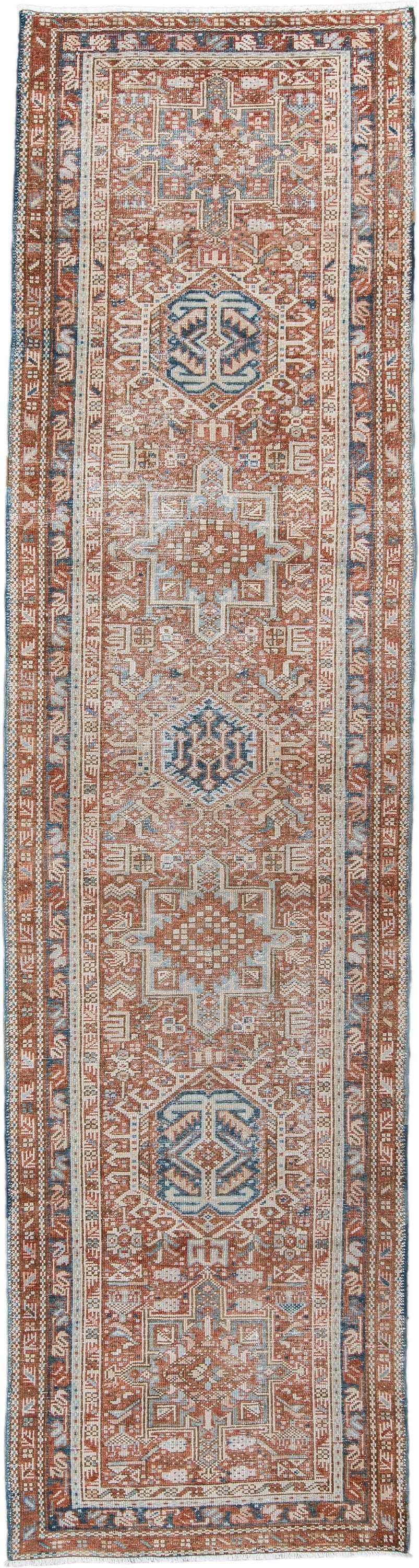 3' x 11' one-of-a-kind handmade antique Karaje runner rug. Color palette: terra cotta, ivory, sky blue, rust, camel, slate