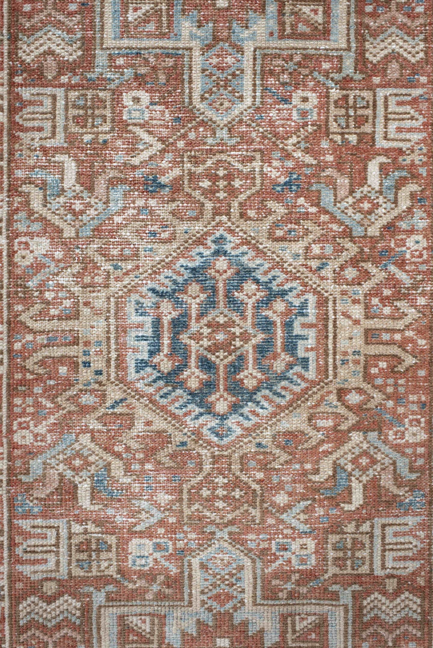 3' x 11' one-of-a-kind handmade antique Karaje runner rug. Color palette: terra cotta, ivory, sky blue, rust, camel, slate