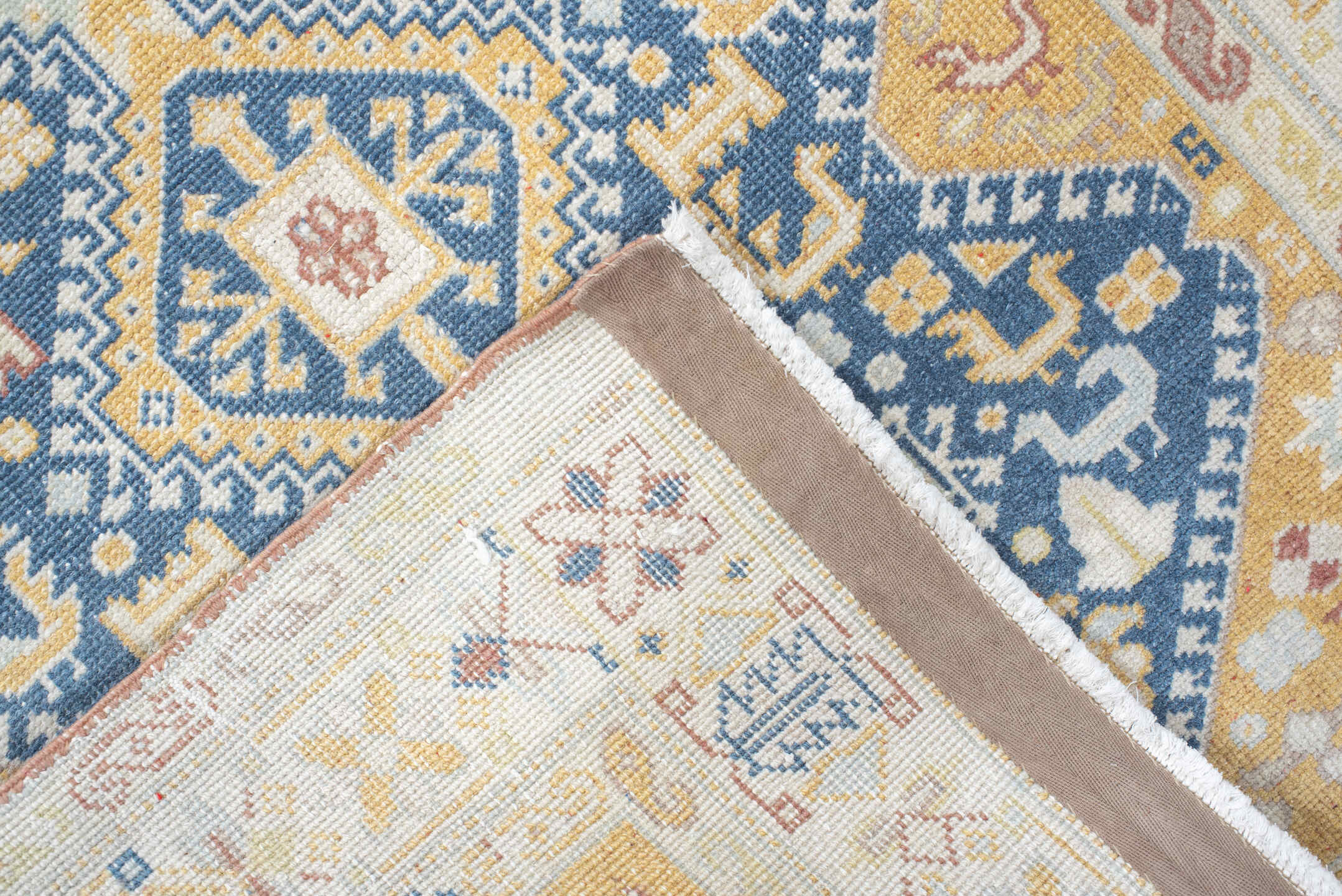 2' x 11' one-of-a-kind handmade antique Sivas runner rug. Color palette: ivory, indigo, gold, camel, pale_blue, taupe, rose