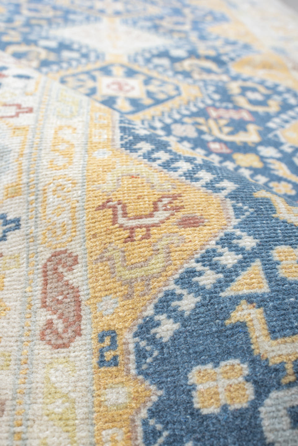 2' x 11' one-of-a-kind handmade antique Sivas runner rug. Color palette: ivory, indigo, gold, camel, pale_blue, taupe, rose