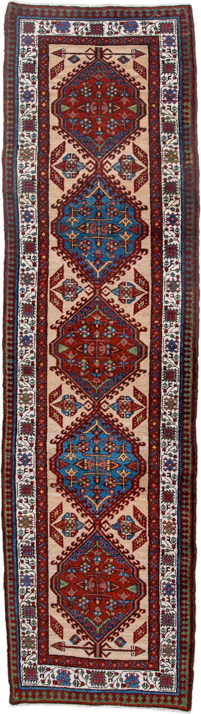 3' x 10' one-of-a-kind handmade antique Sarab runner rug. Color palette: ivory, rust, sky blue, crimson, navy, teal, brown