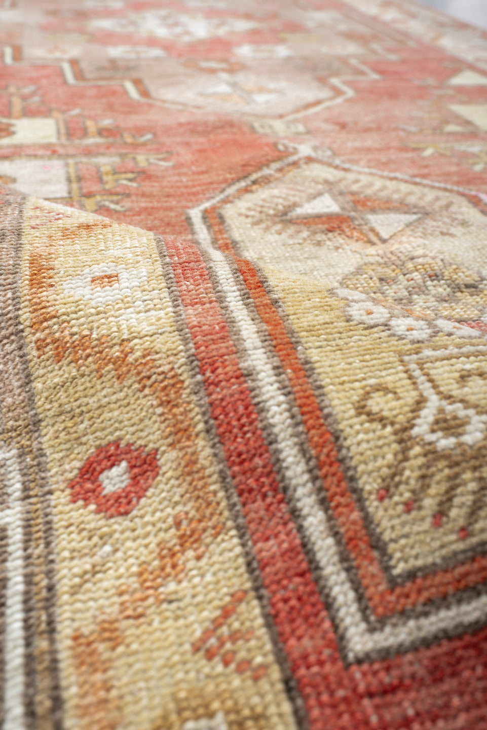 3' x 10' one-of-a-kind handmade antique Anatolian runner rug. Color palette: terra cotta, ivory, taupe, sage, rust, camel